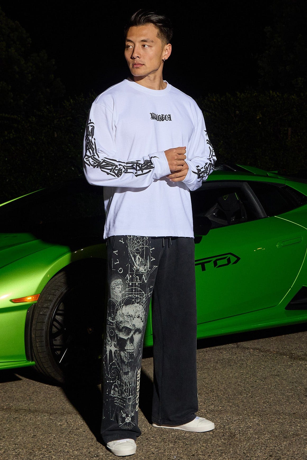 Close-up of fabric texture and detailed print on baggy sweat pants