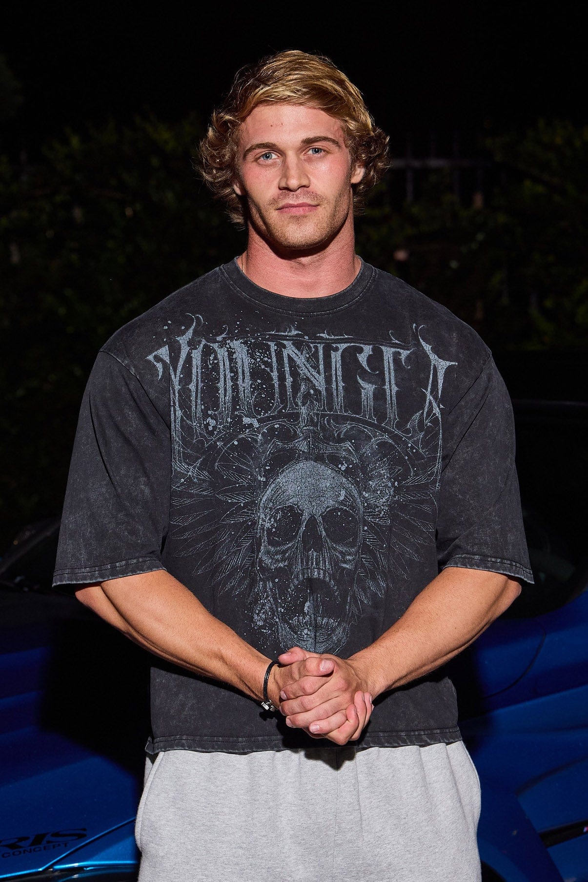 Front view of acid wash tee showing boxy fit and graphic design