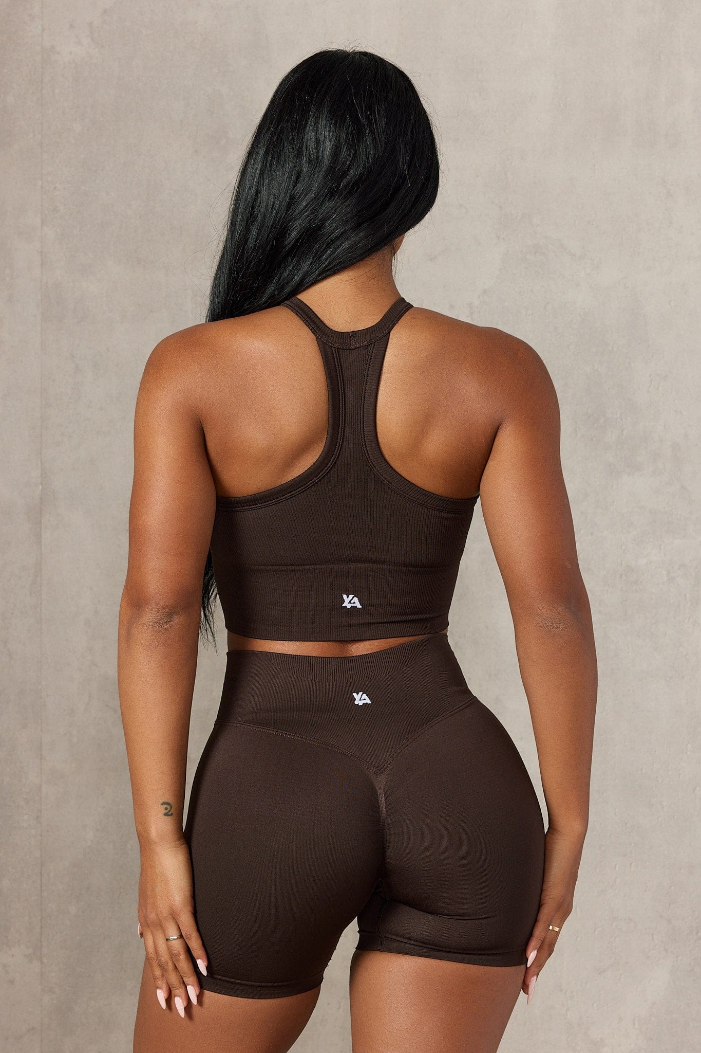 Back view of the Legacy Seamless Tank, showcasing its flattering fit and soft fabric.