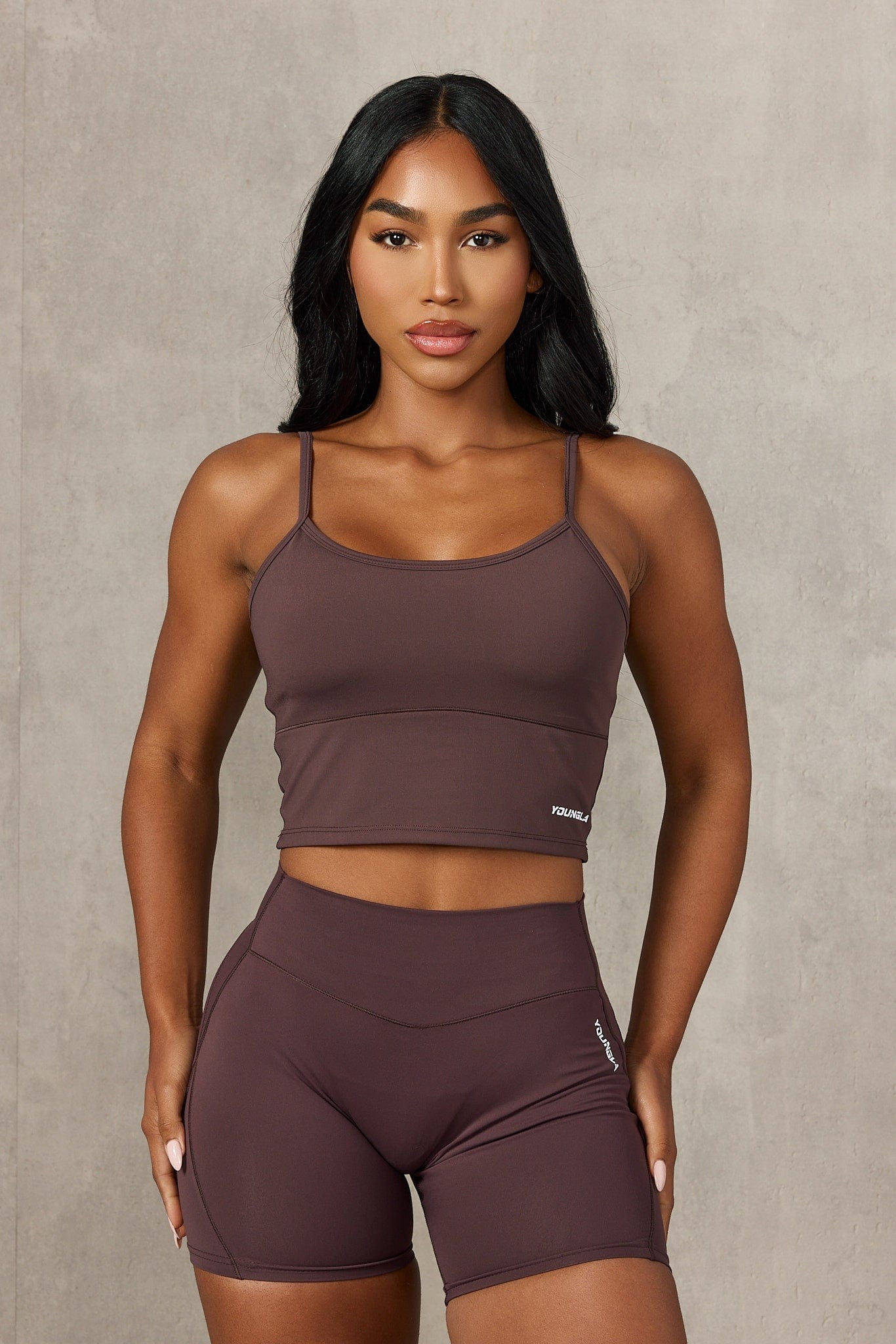 Front view of the Sculpted Support Fitness Tank for Women in action during a workout.