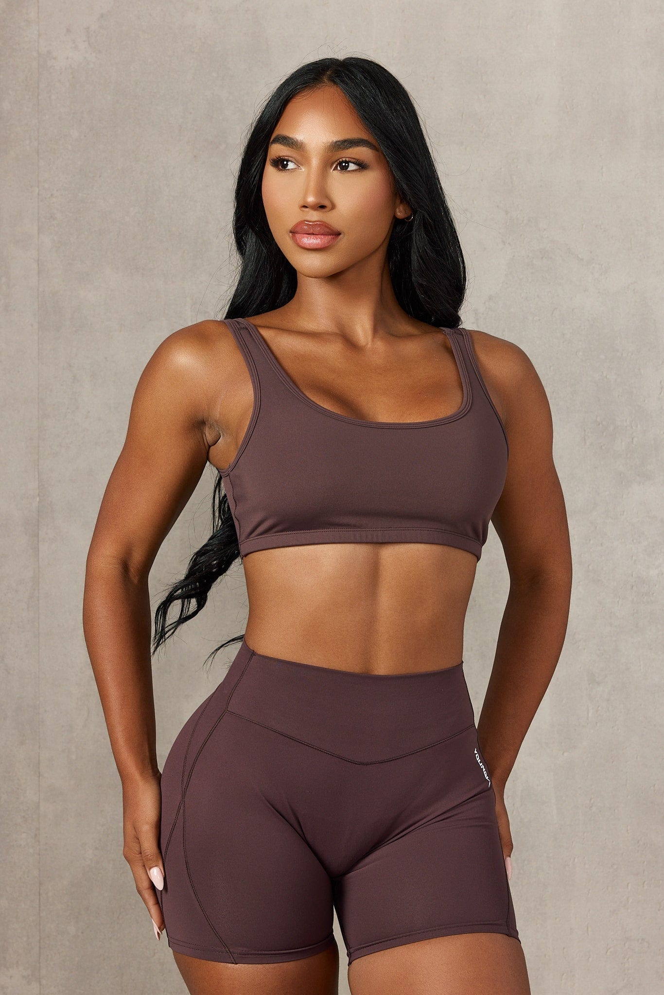 Close-up of the W355 Locked In Sports Bra in black, highlighting support features