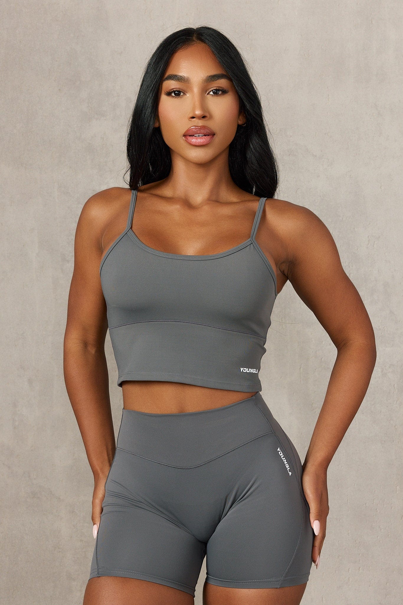 Front view of the Sculpted Support Fitness Tank for Women in action during a workout.