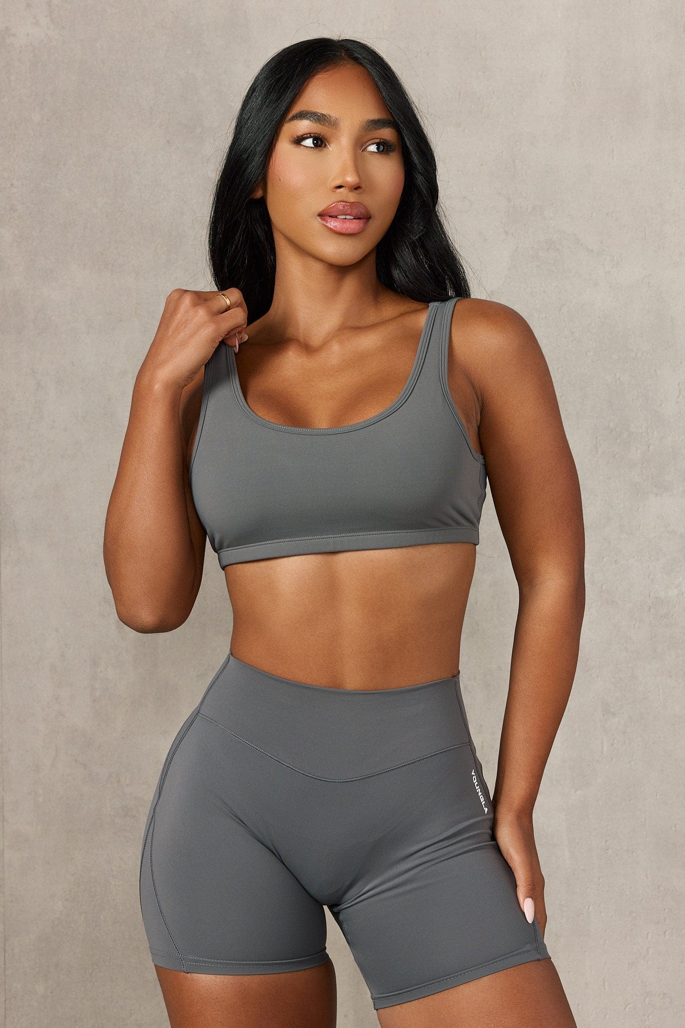 Close-up of the W355 Locked In Sports Bra in black, highlighting support features