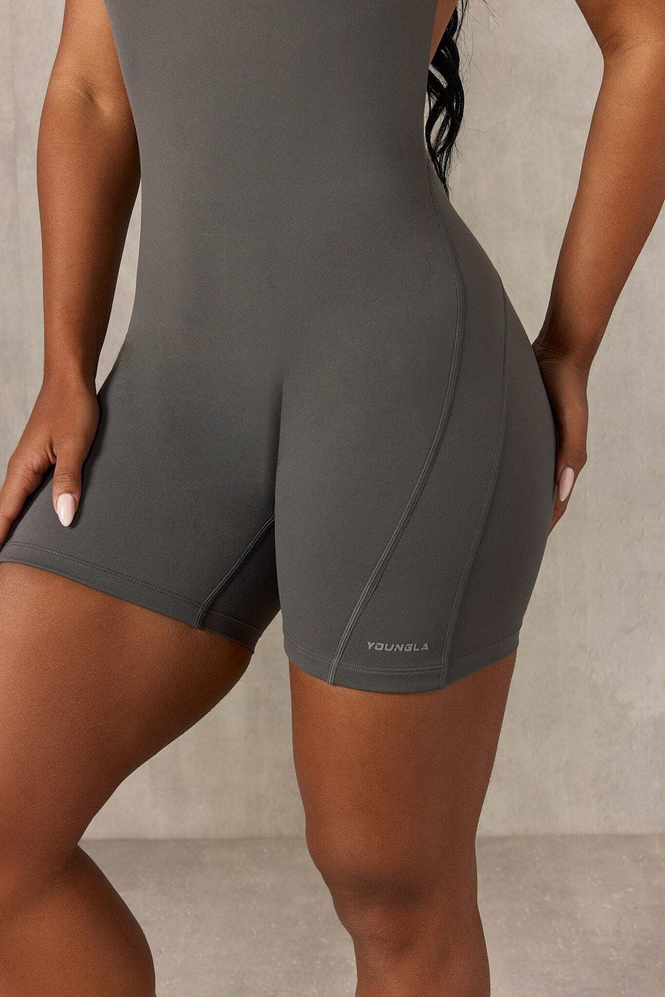 Close-up of the backless black rompers sleek nylon-spandex fabric