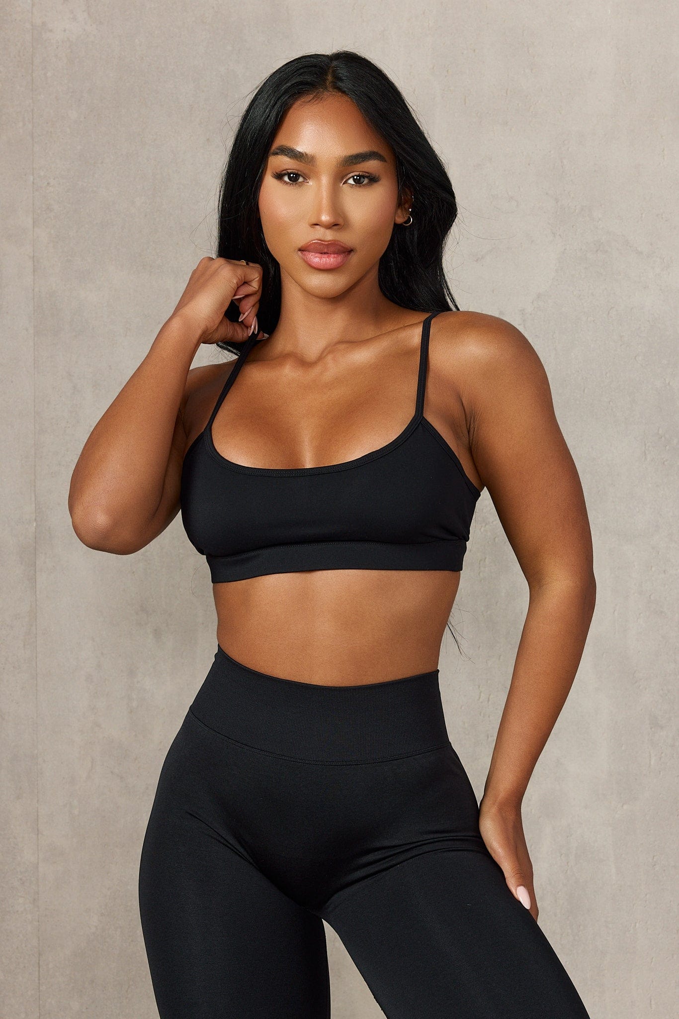 Close-up of the Legacy Sports Bra with adjustable straps and minimal design for active women