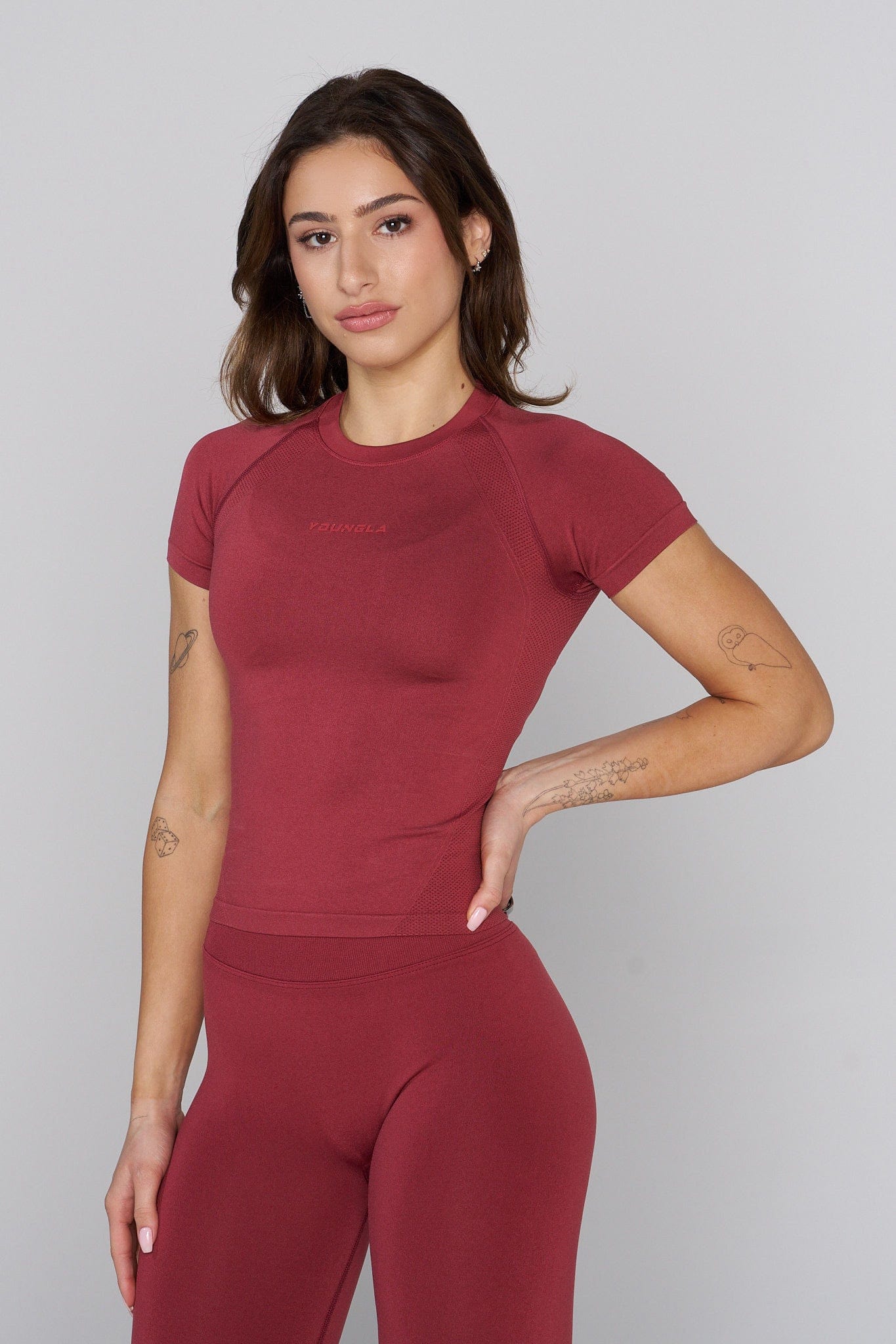 Front view of CurveFit seamless compression shirt showcasing its sleek design.