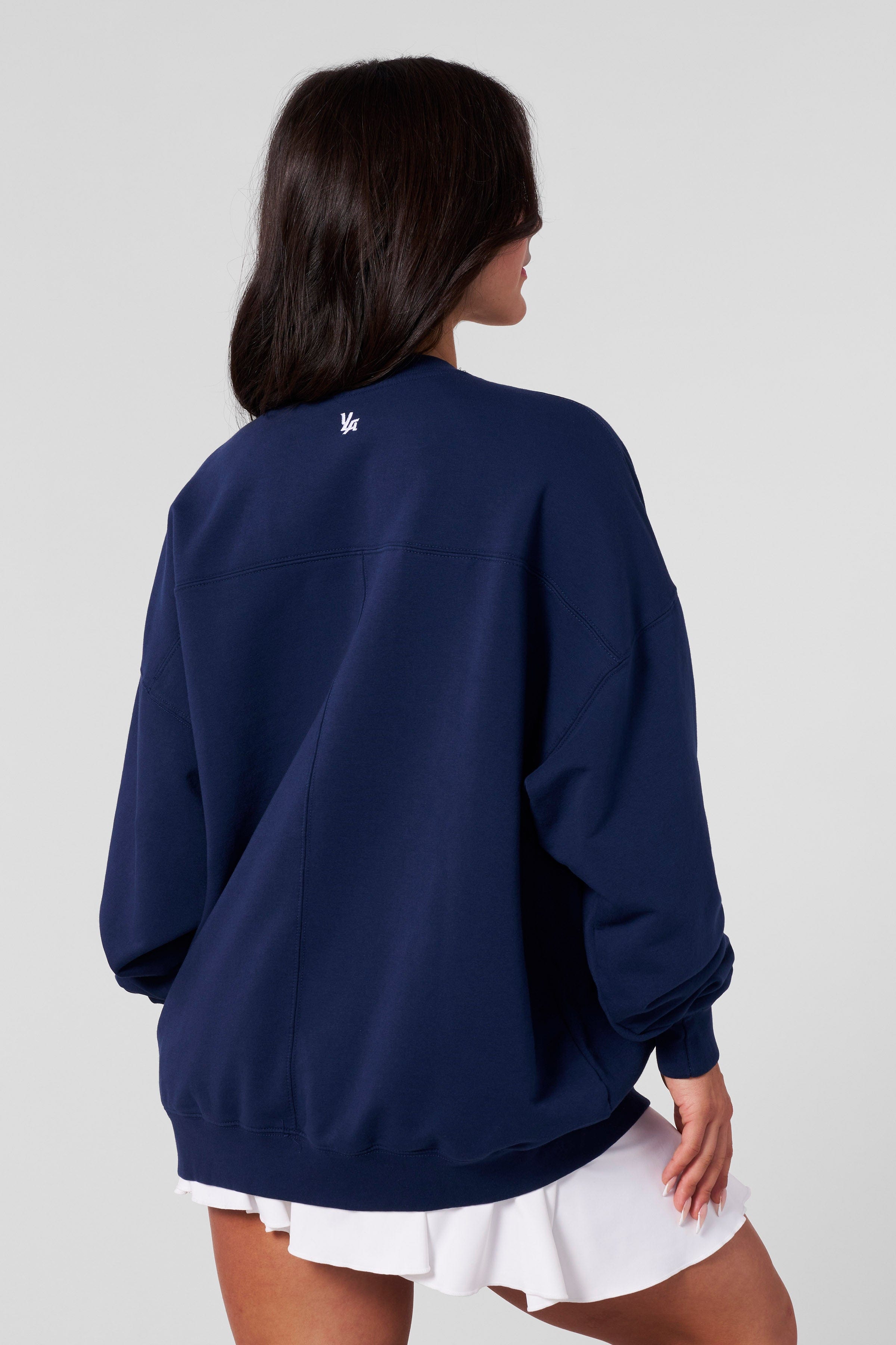 Oversized sweatshirt styled with jeans for a relaxed look
