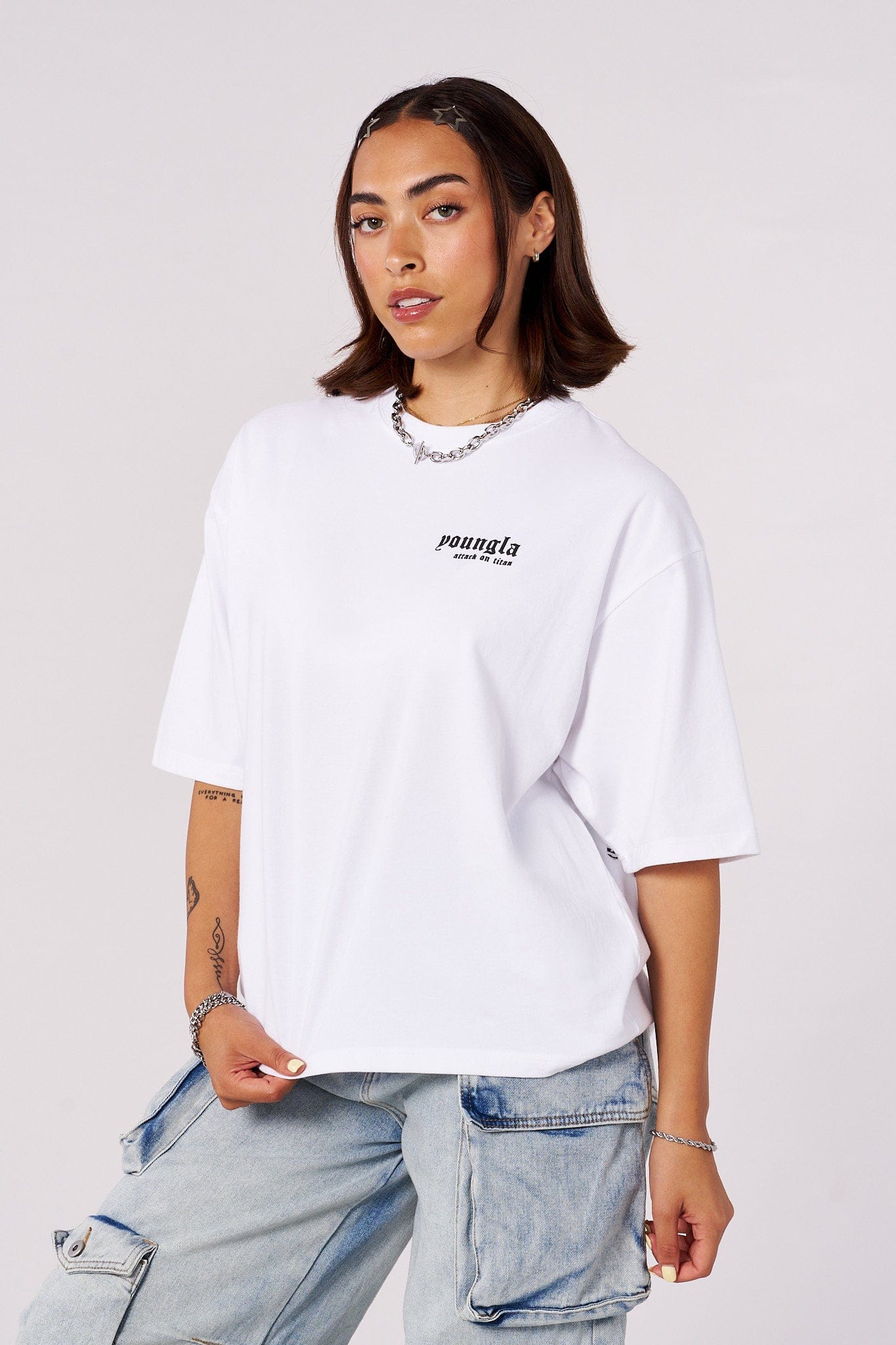 Back view of the boxy cropped tee highlighting its relaxed fit.