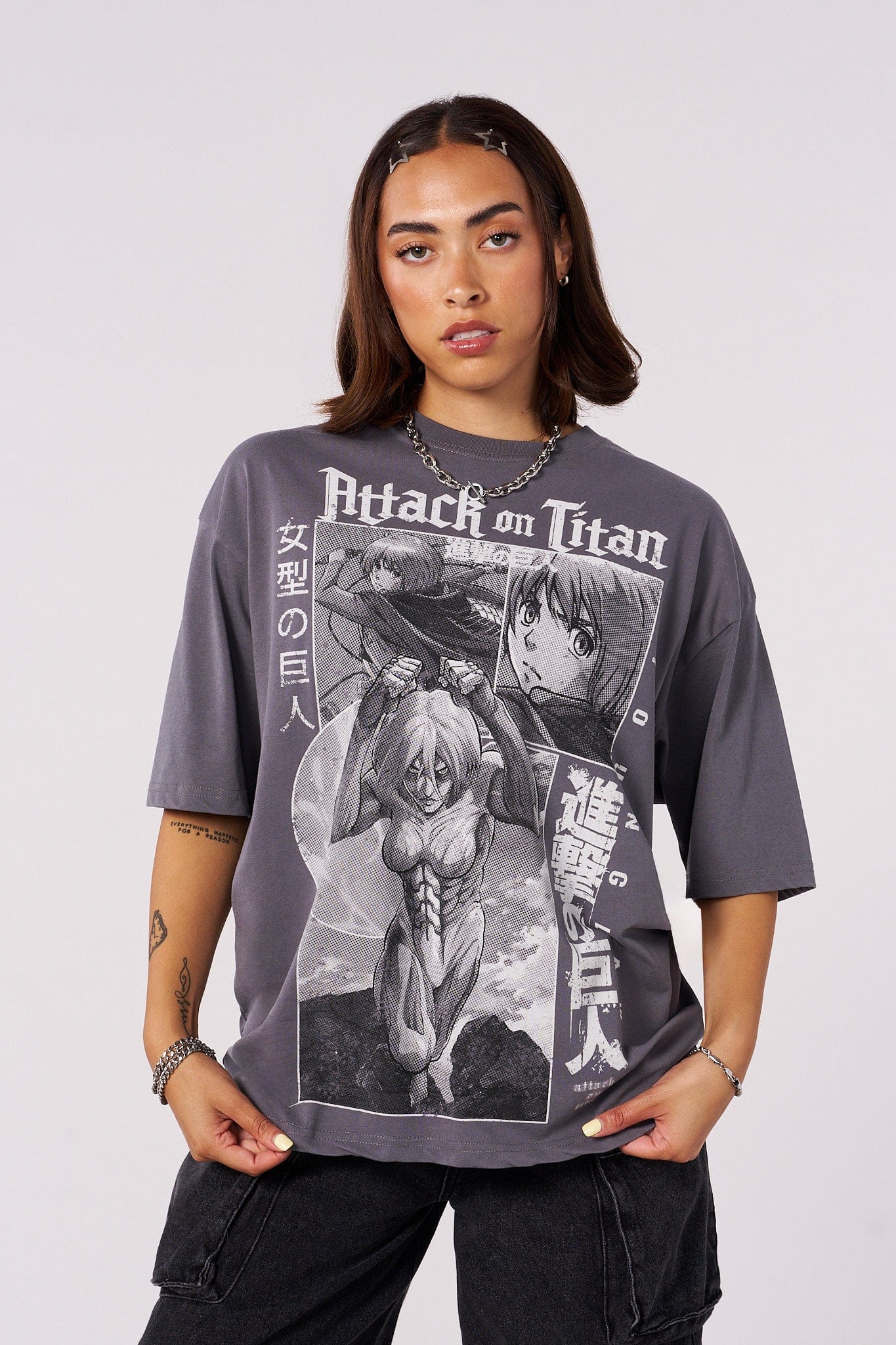 Front view of Attack on Titan graphic tee in a casual setting.