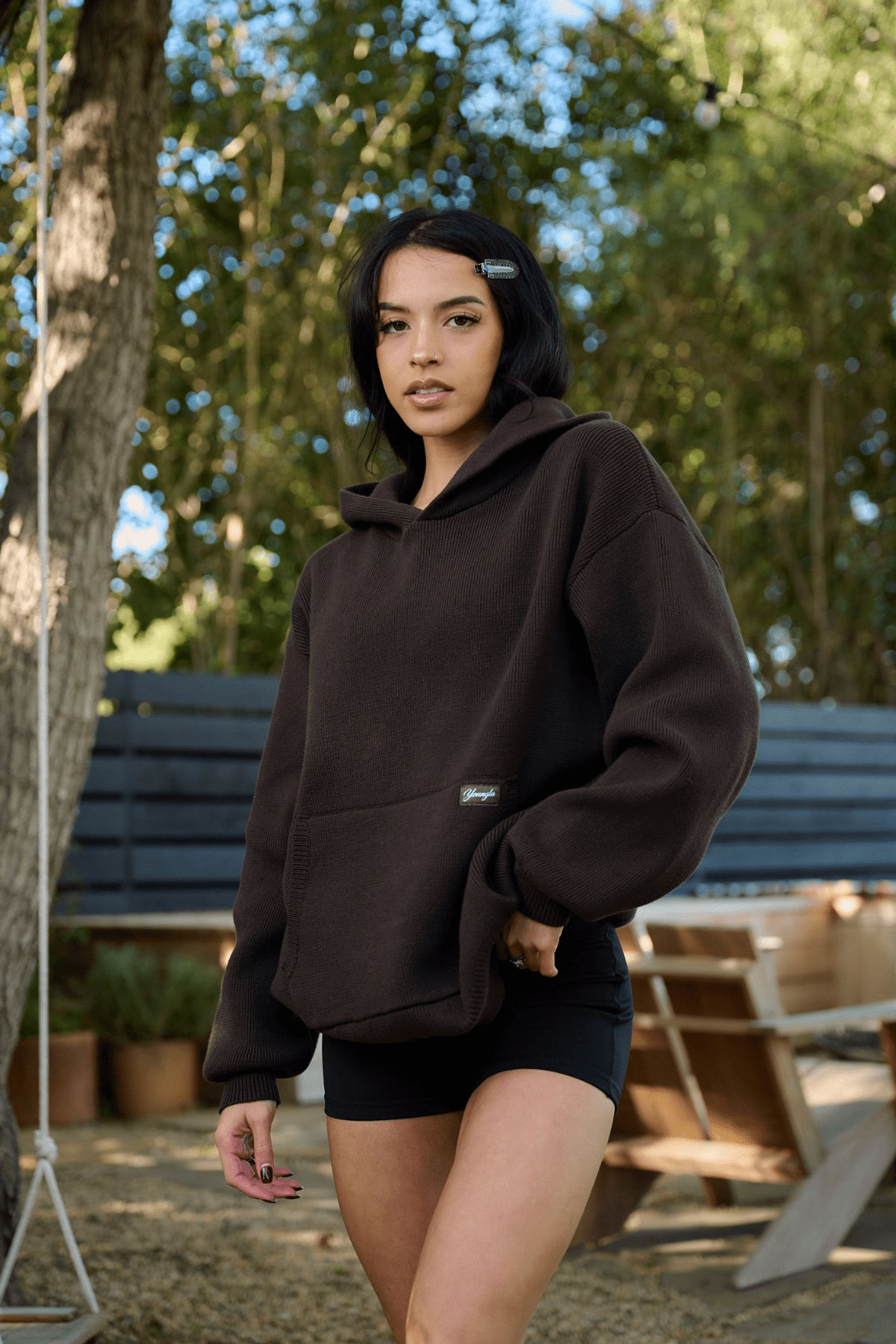 Close-up of YoungLA logo on the womens sweater hoodie.