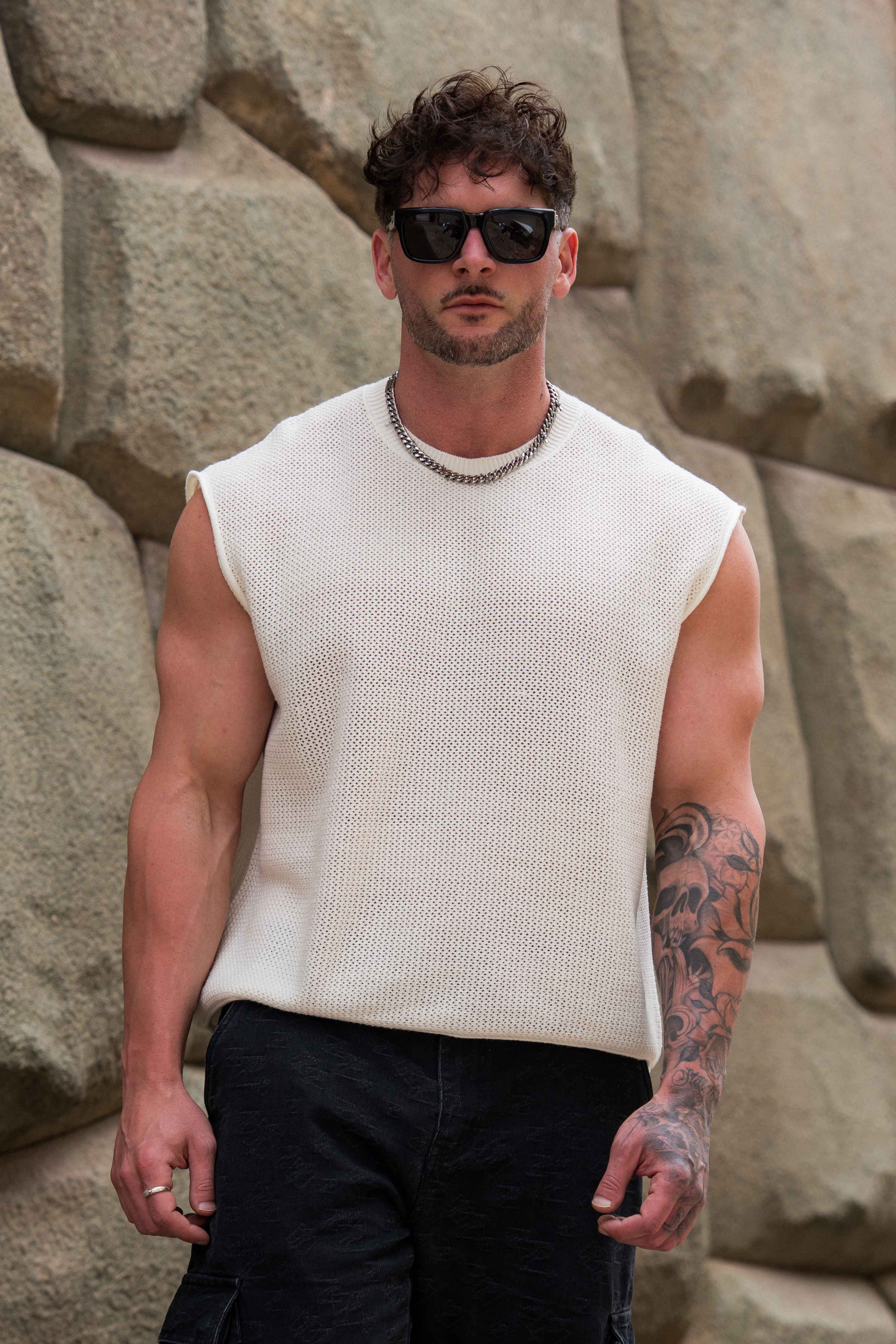 Close-up of the drop shoulder knit top showing its soft texture and relaxed fit