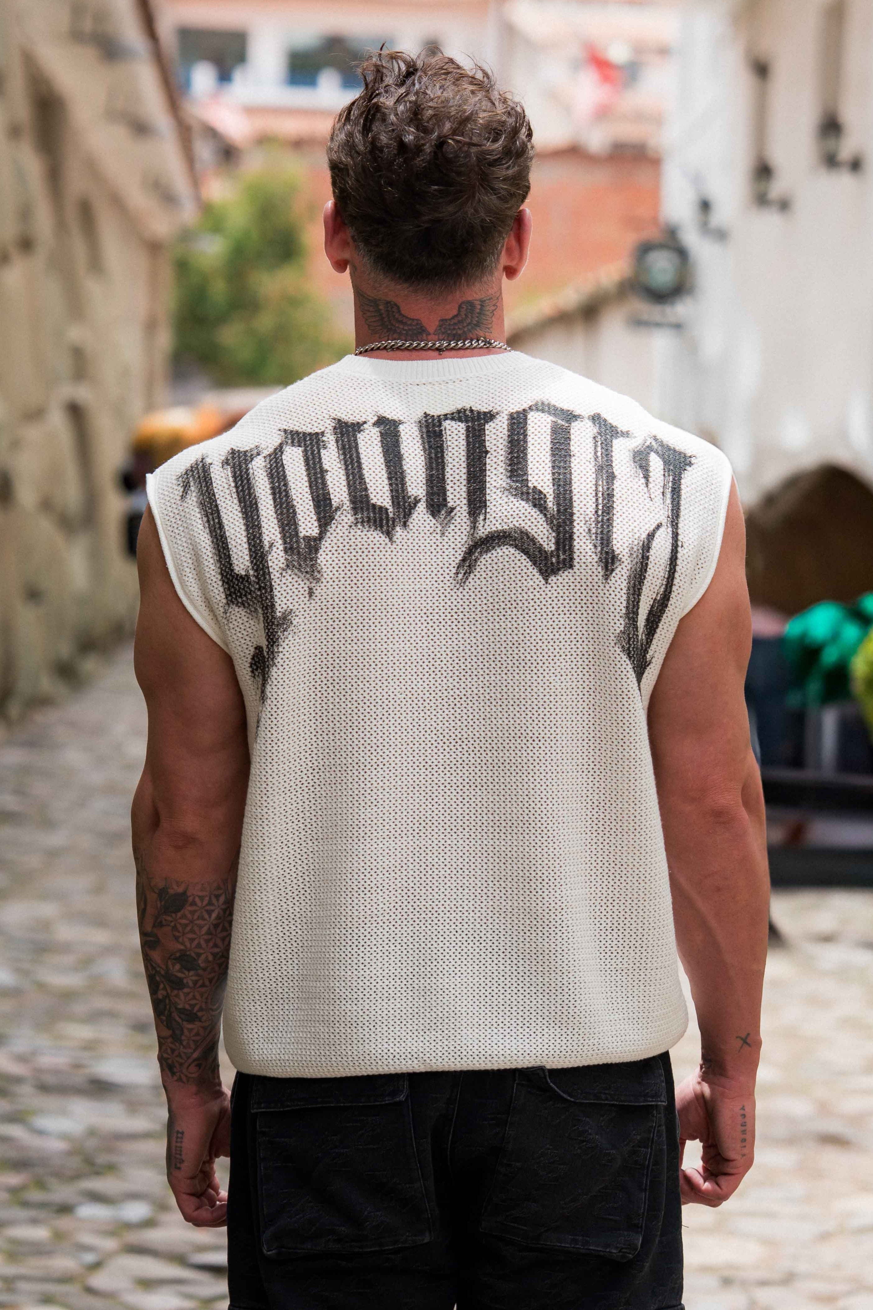 Close-up of the drop shoulder knit top showing its soft texture and relaxed fit