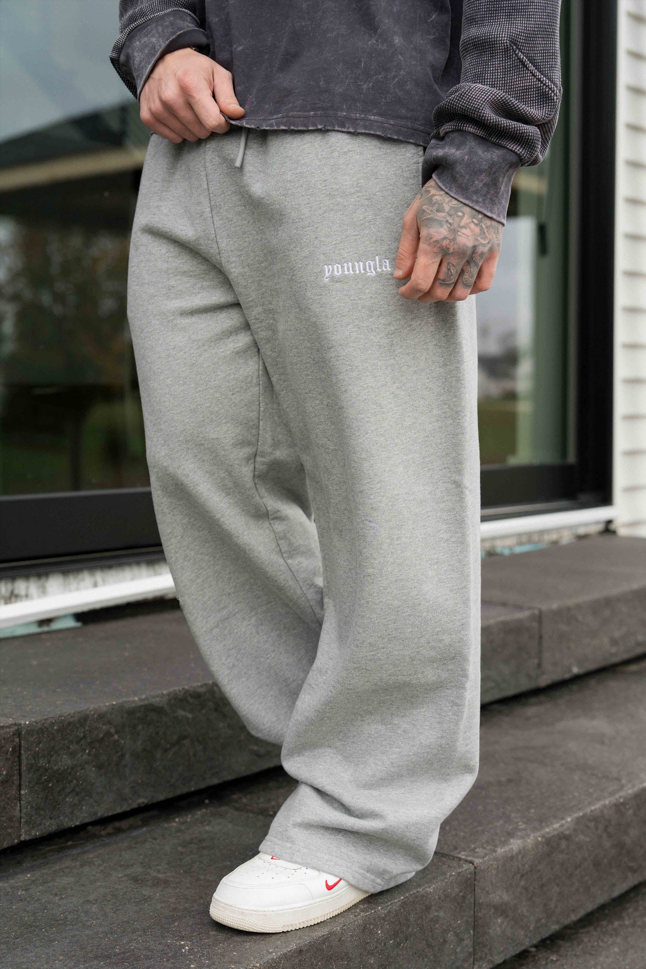 Close-up of fabric texture on relaxed fit pants for everyday comfort.