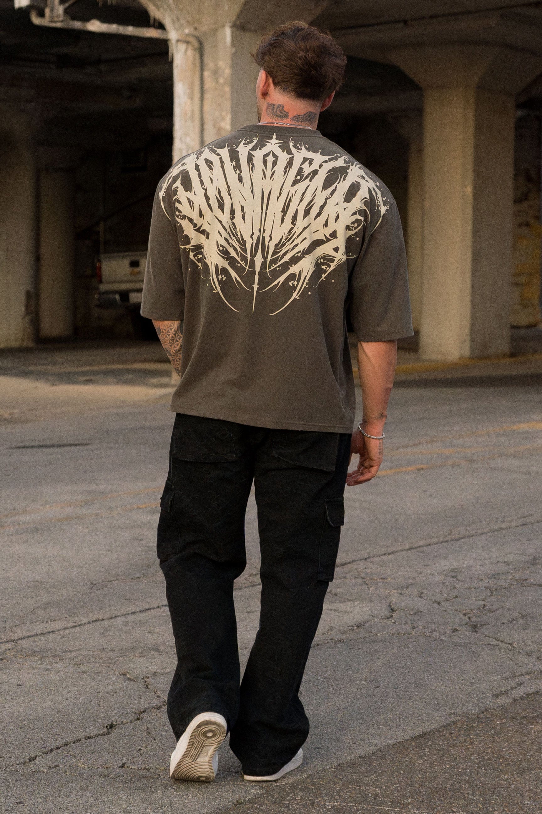 Back view of the oversized t shirt highlighting the bold graphic.