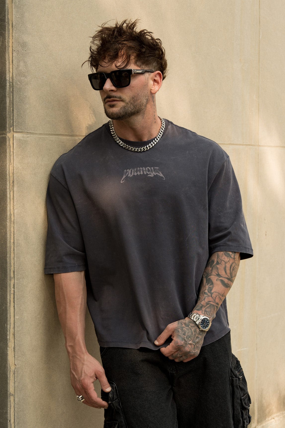 Front view of galaxy-themed oversized t shirt on a casual model