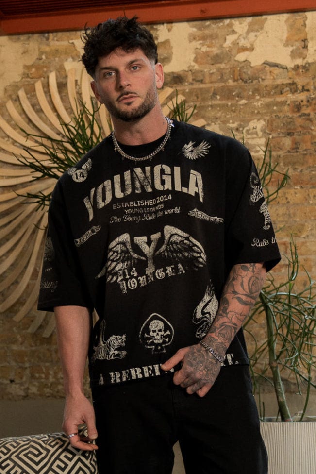 Side view of the Rebel Vintage Graphic Tee highlighting the distressed edges.