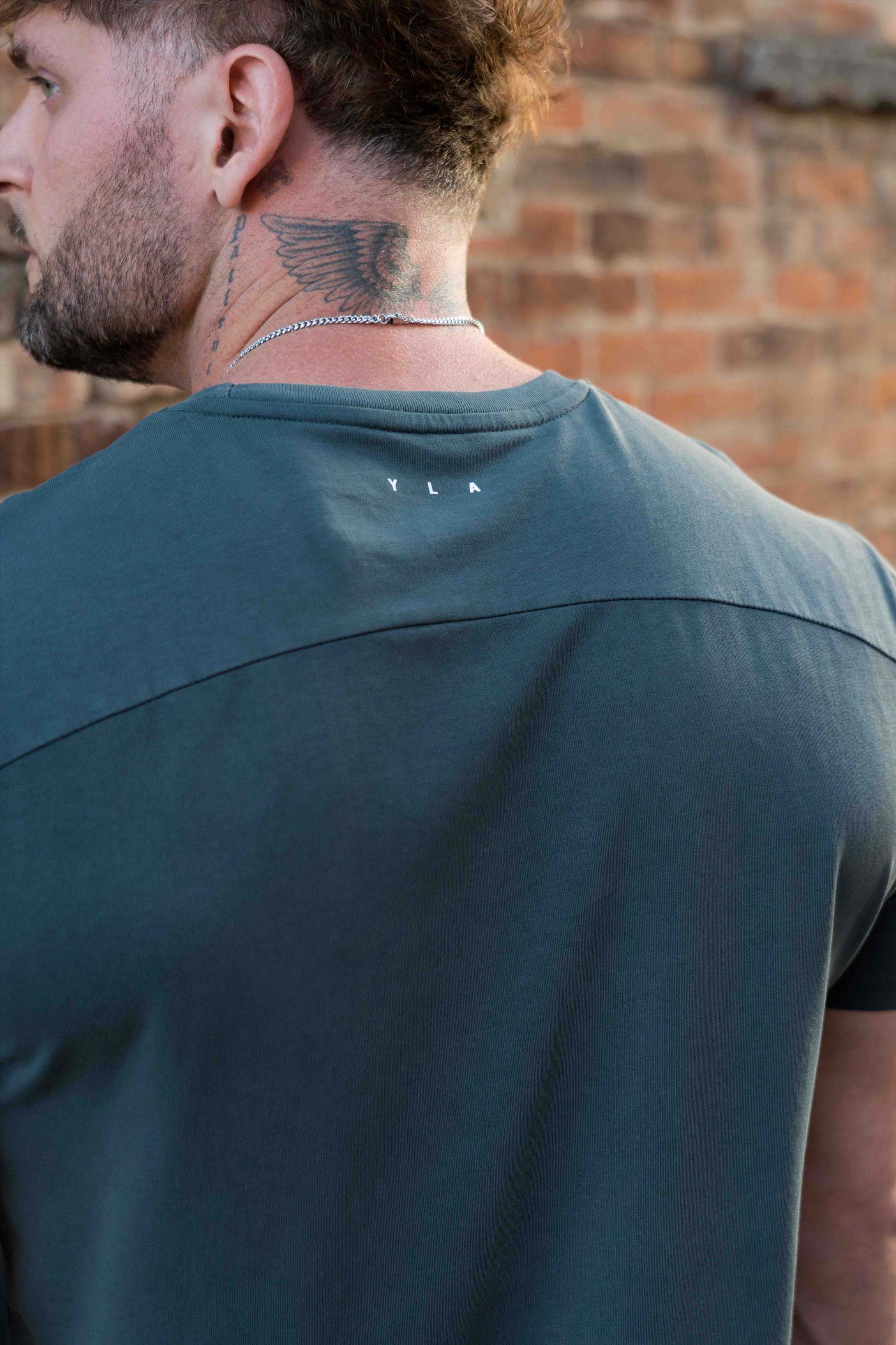 Back view of the muscle tee, showcasing the lightweight fabric.