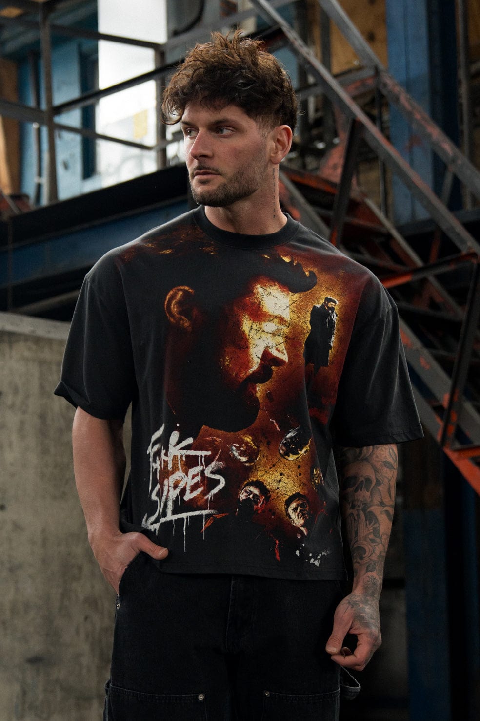 Side angle of a relaxed fit graphic tee for streetwear fans.