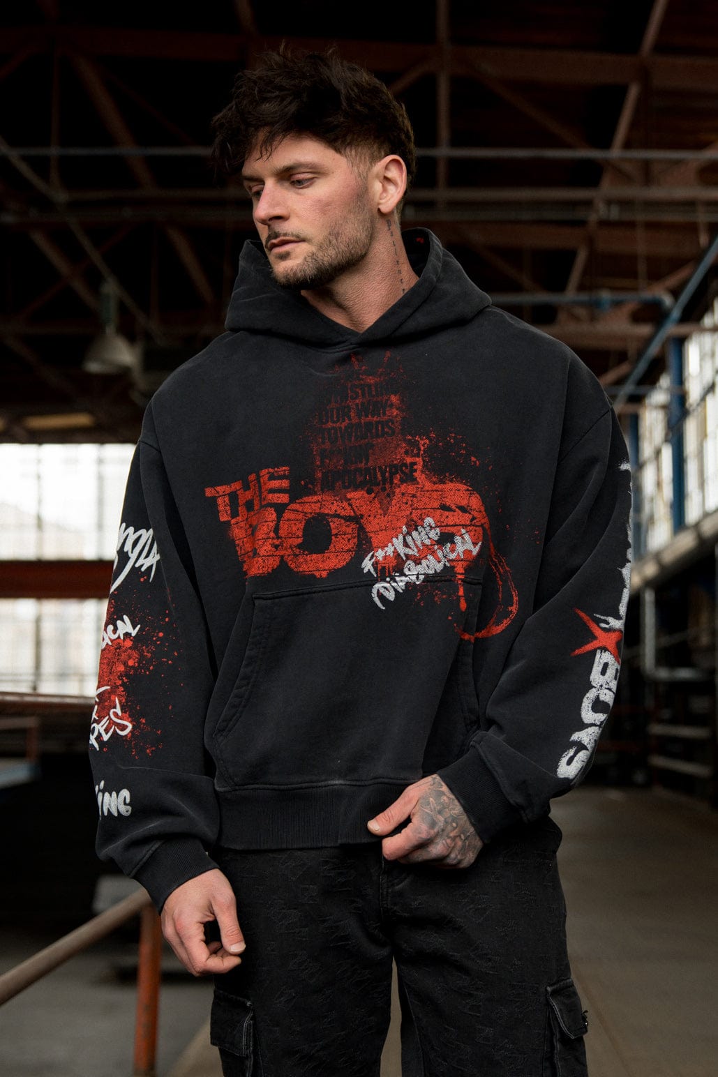Side view of the hoodie showing its comfortable oversized fit.