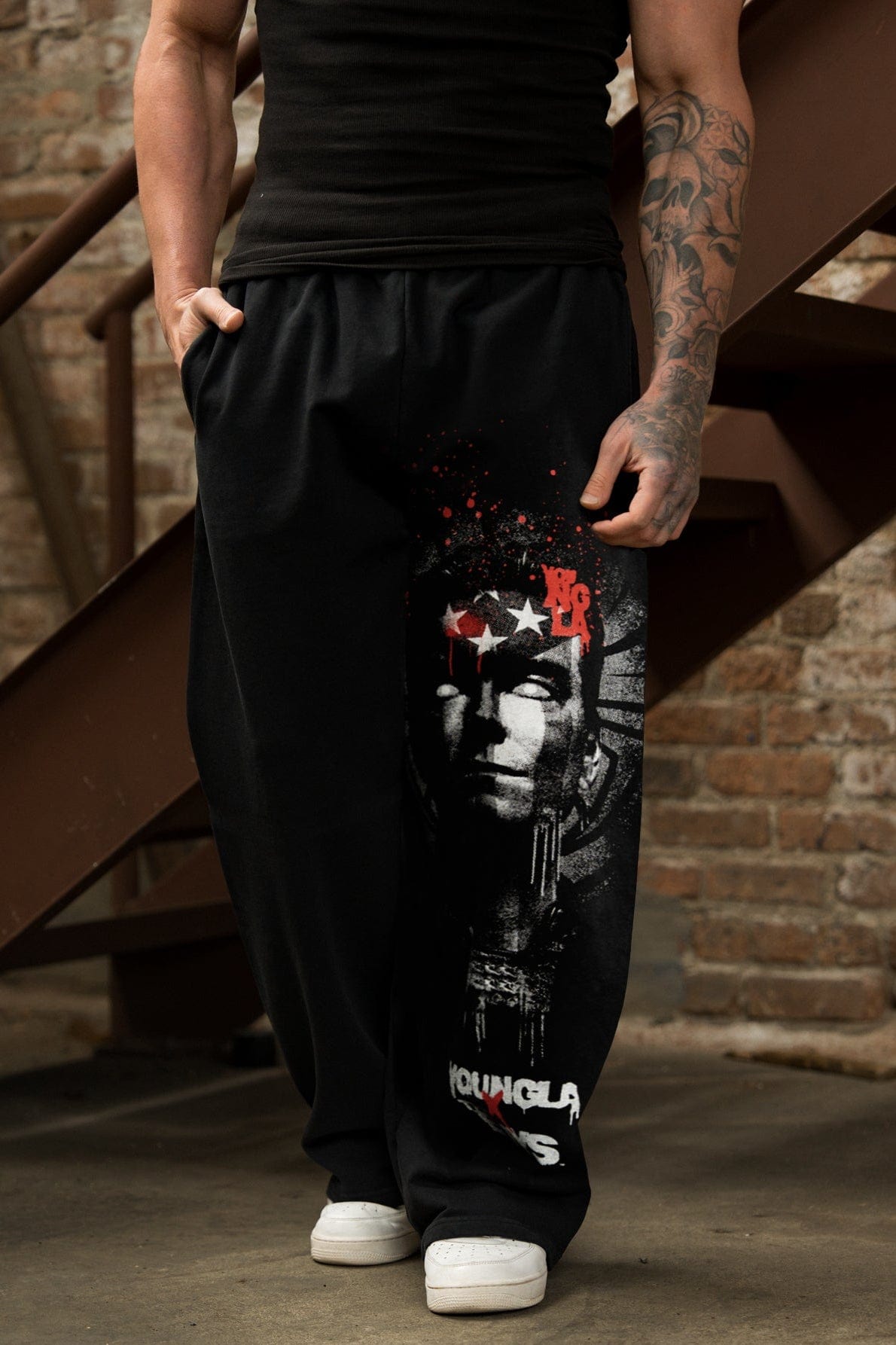Savage Graphic Sweats displayed on a model, emphasizing the baggy fit.
