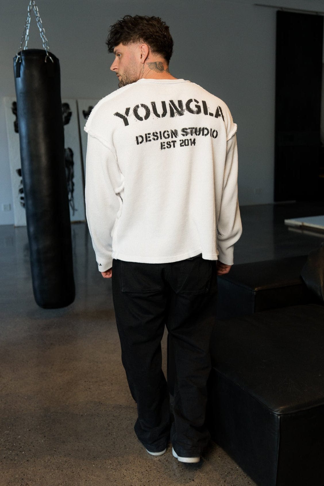 Urban outdoor shot of thermal long sleeve shirt in heavyweight cotton