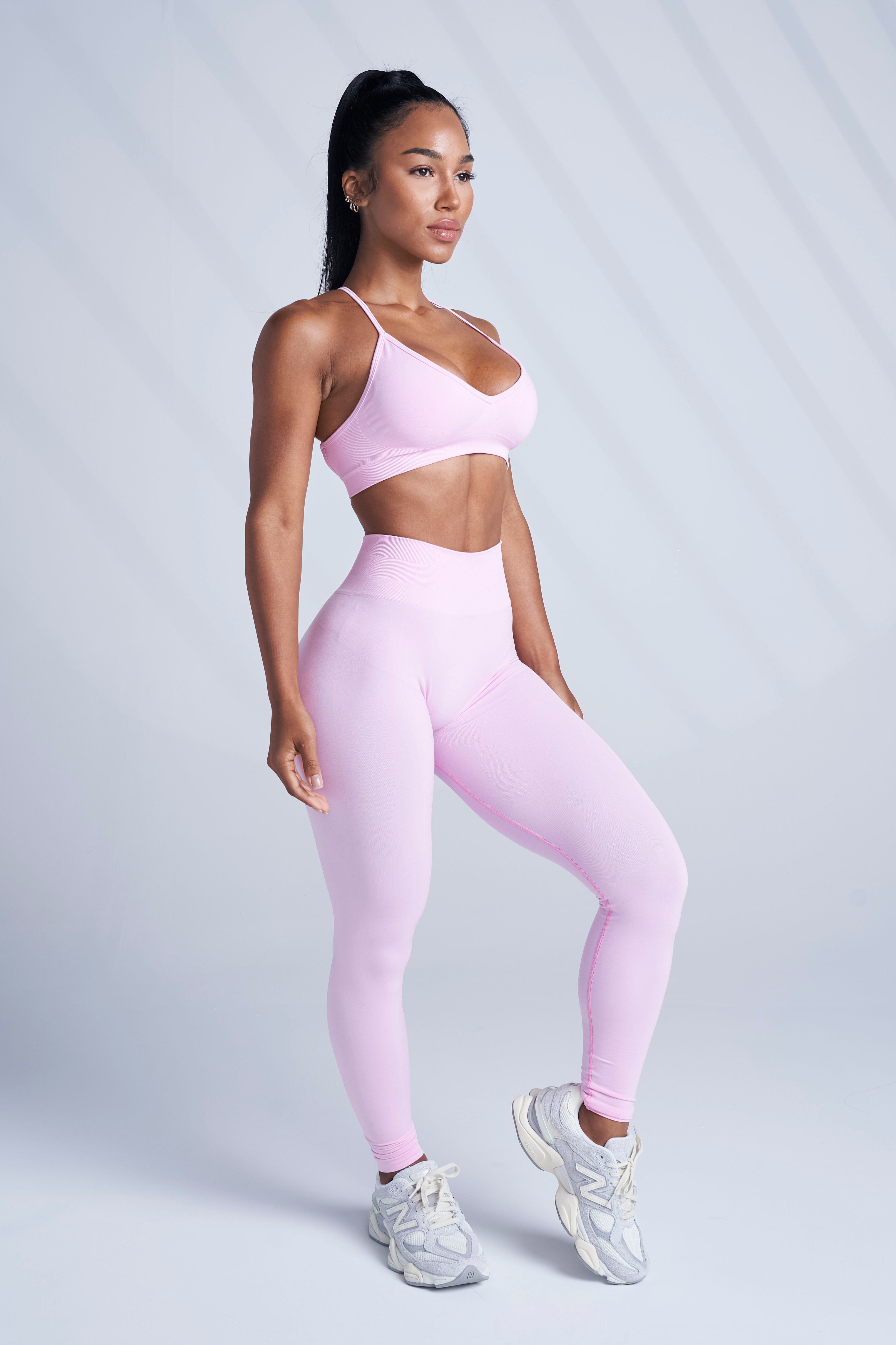 Front view of seamless compression leggings for women during yoga.