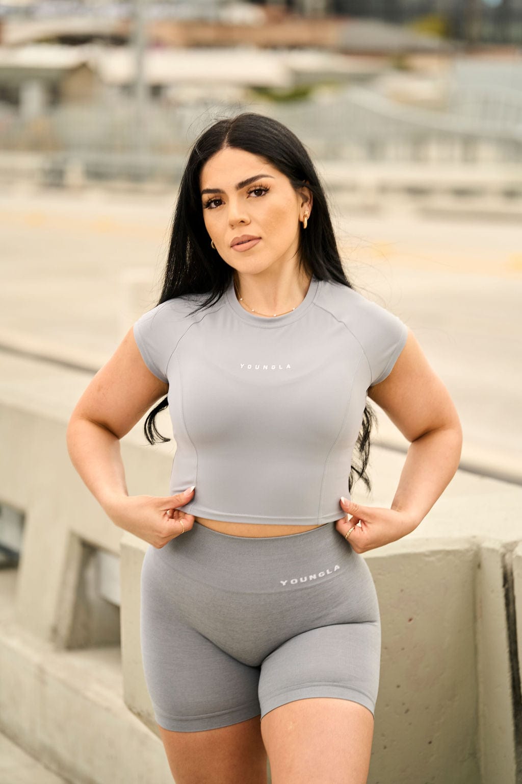 Front view of Elevate Compression Crop Top in action during a workout.