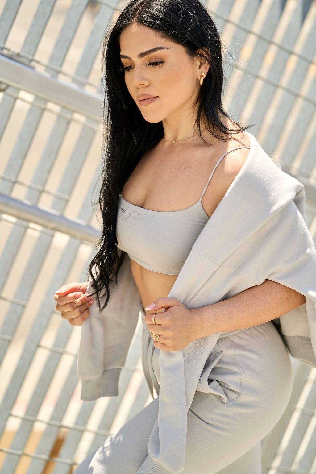Model wearing the Iris cropped tank top in natural sunlight
