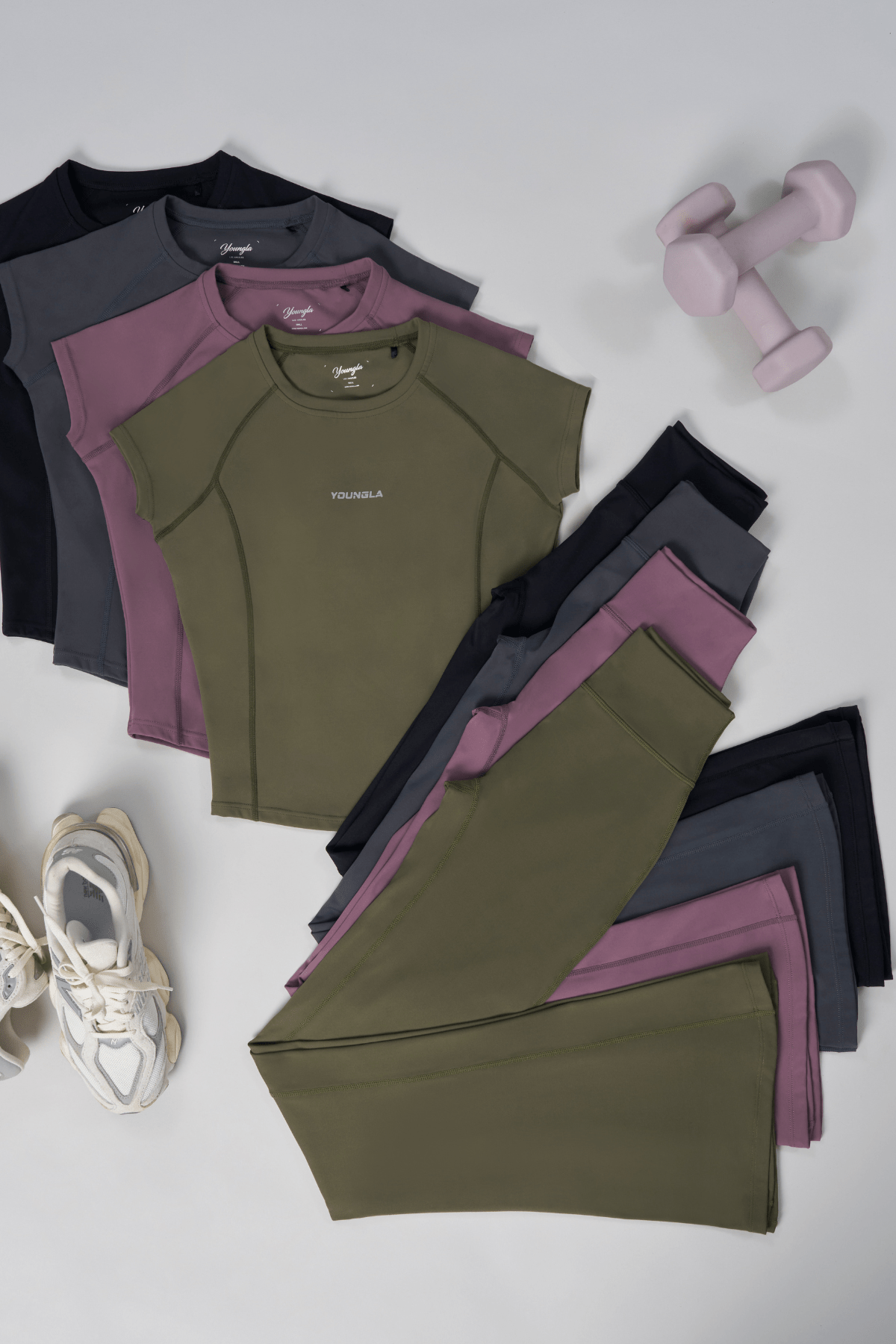 Close-up of high-waist grey flare leggings on a model