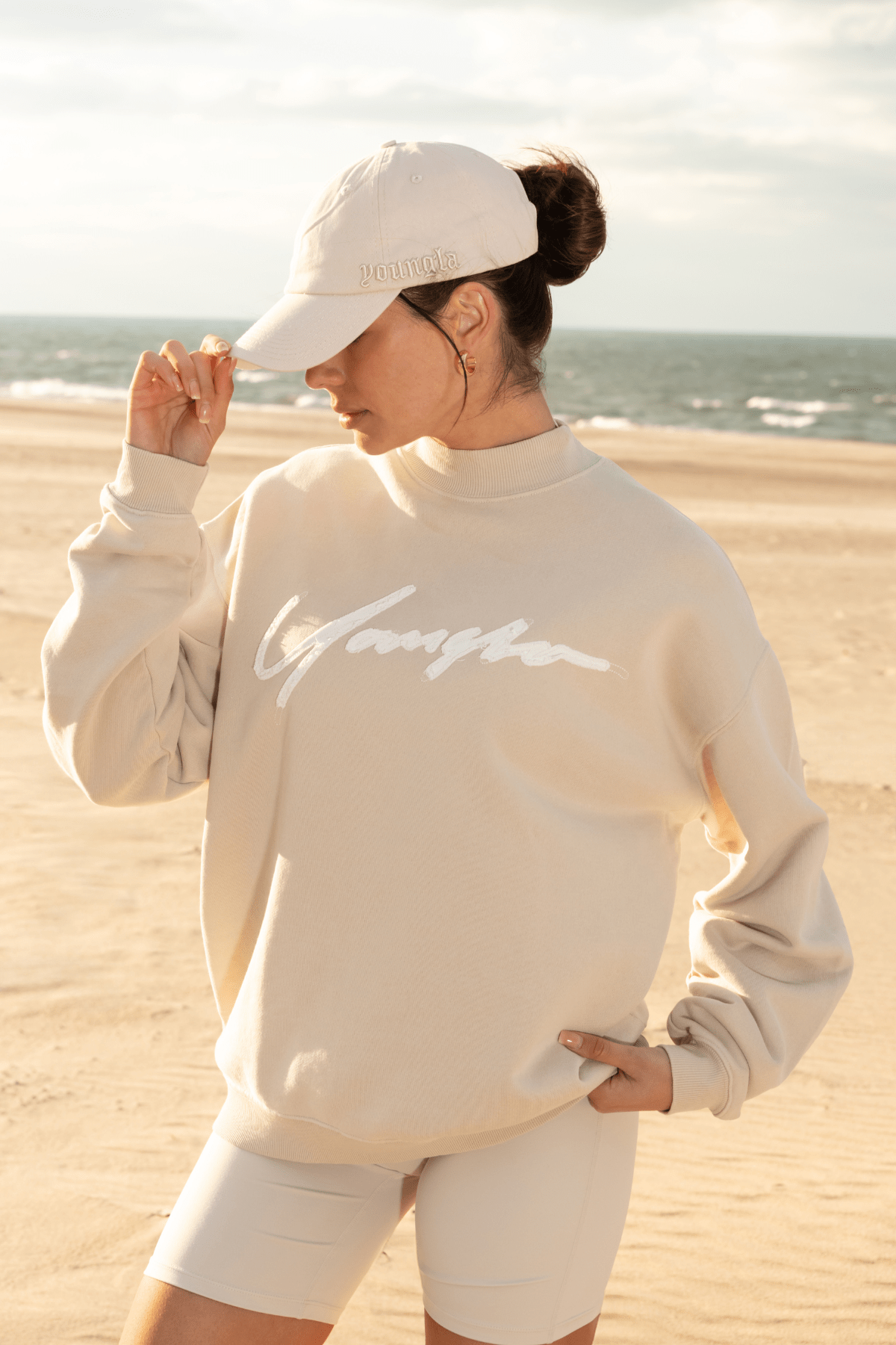 Close-up of the high neck and textured terry fabric of the crewneck sweatshirt