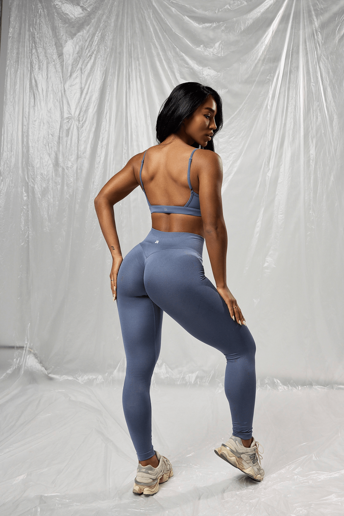 Side view of scrunch detail on leggings, highlighting contour fit