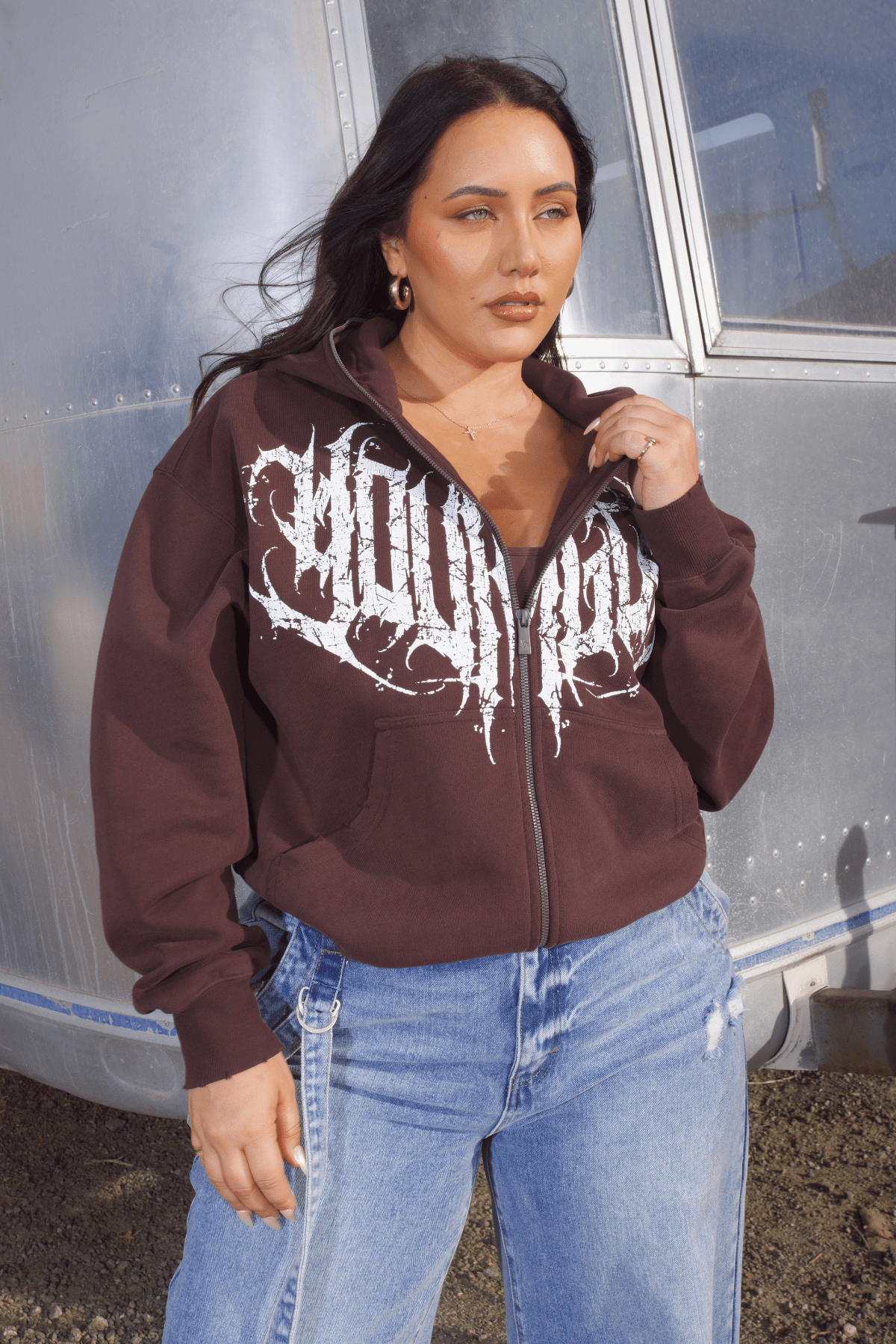 Front view of the oversized zip hoodie showing the full zipper and relaxed fit