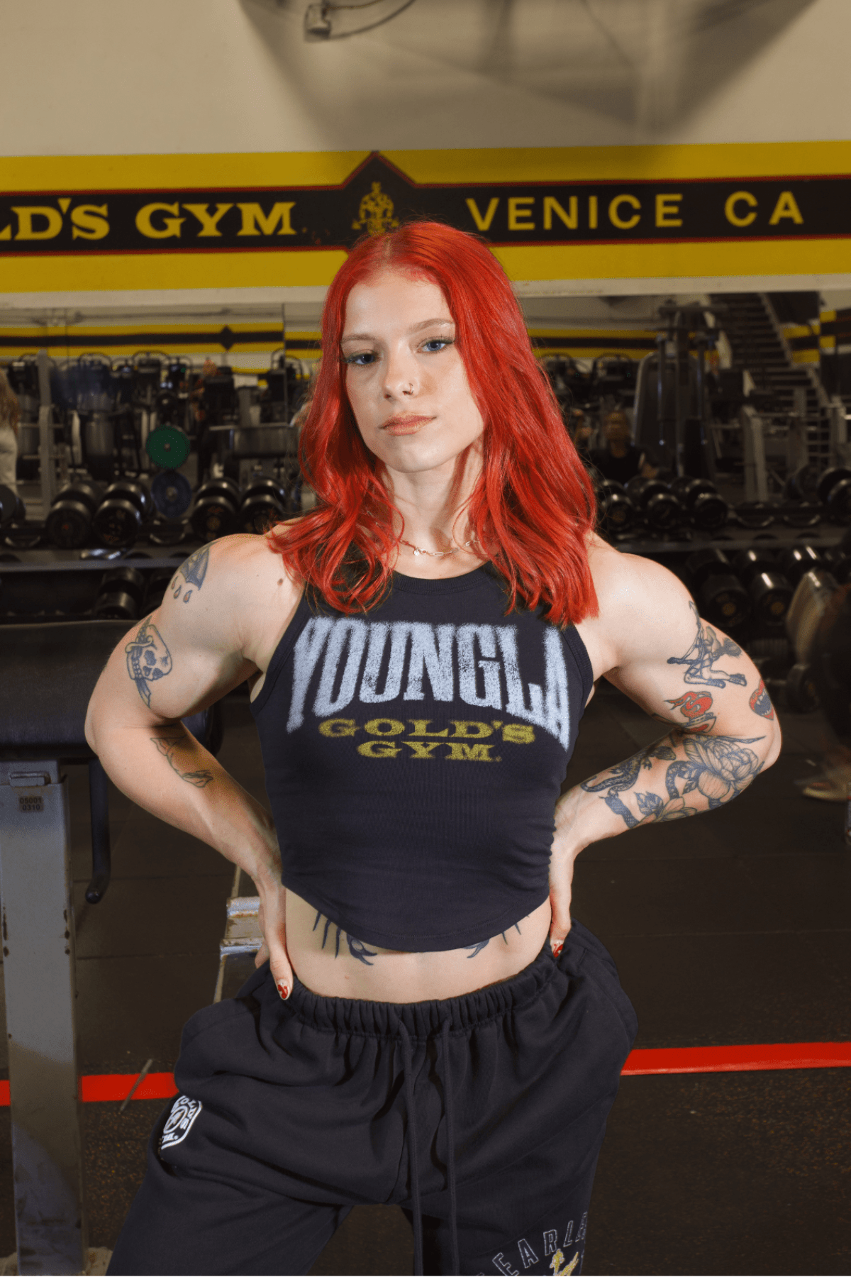 Front view of Golds Gym tank top on a model showcasing its fit.