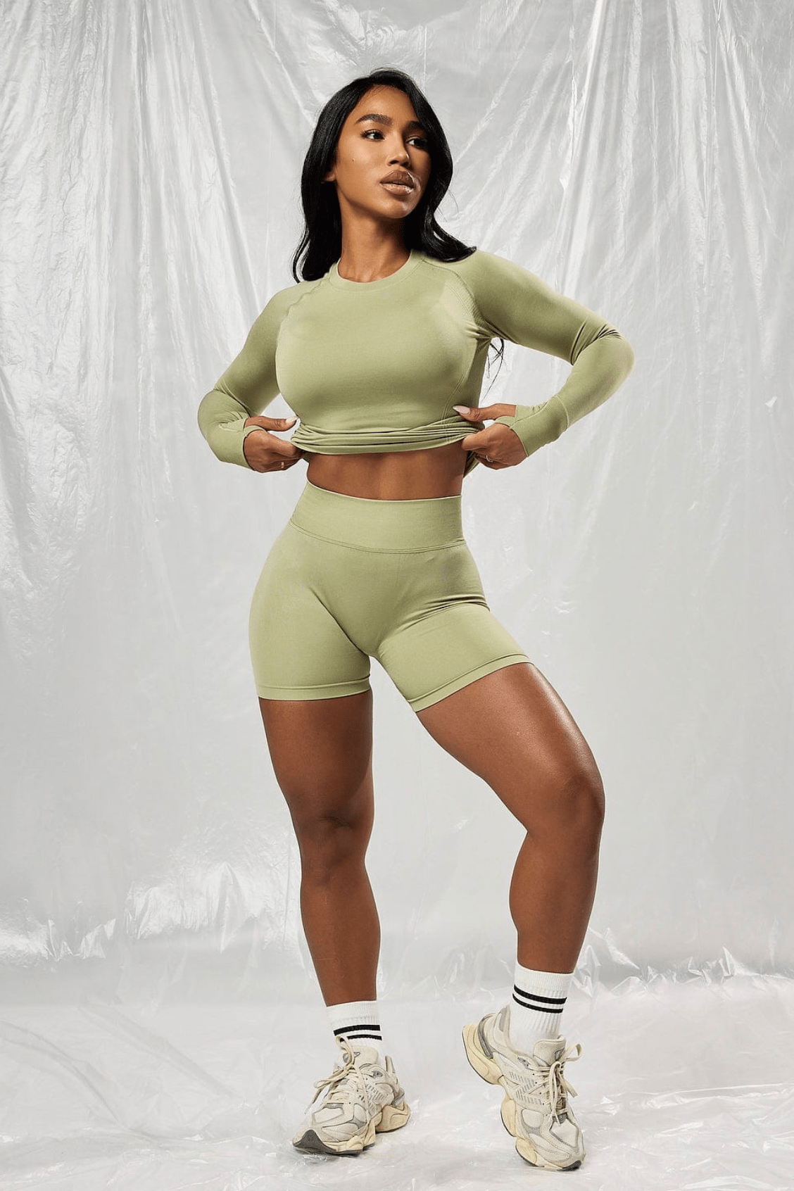 Back detail showing V-cut design of workout shorts with pockets