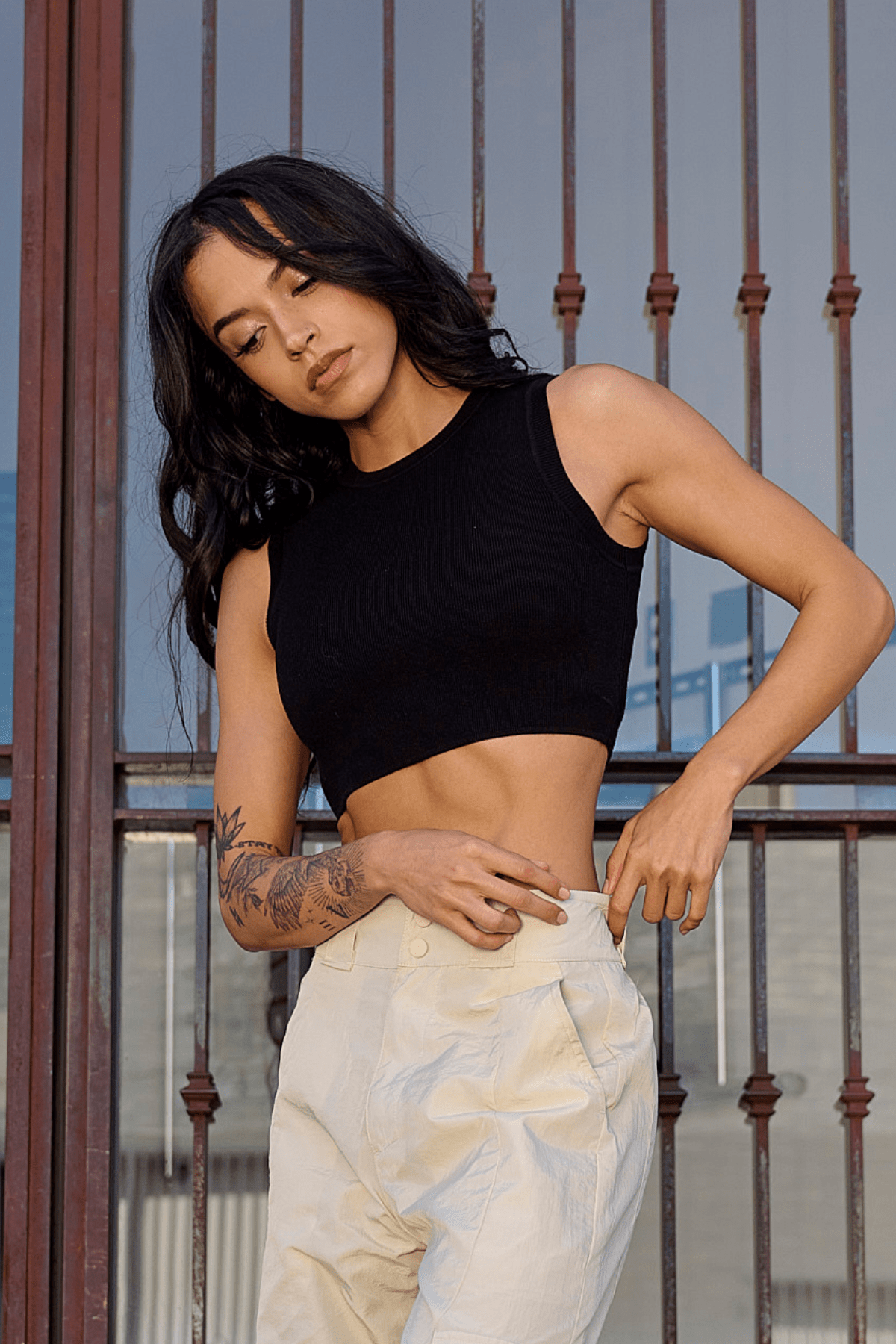 YoungLA black crop top worn with denim for an urban autumn outfit
