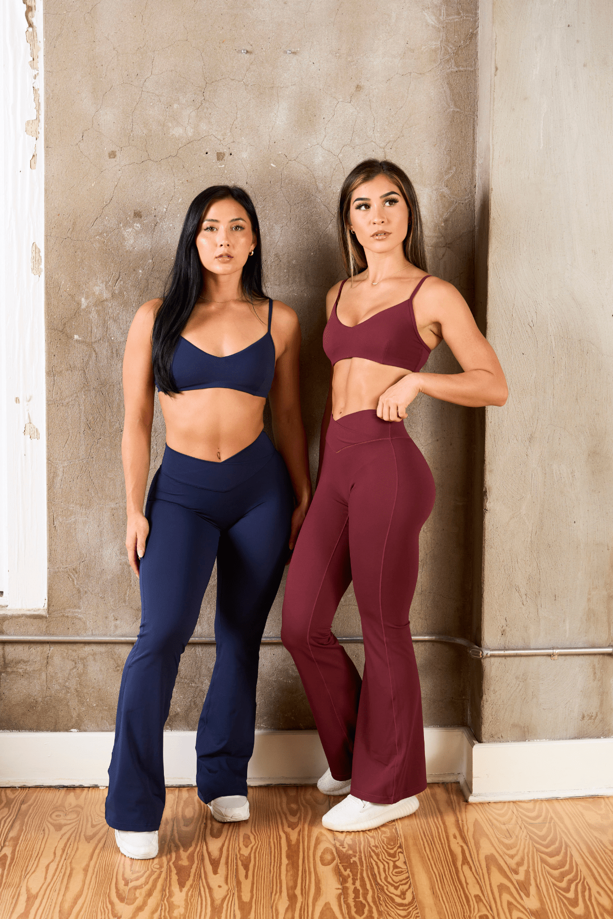 Back view of the model in Vital Flare Leggings, demonstrating the flattering fit.