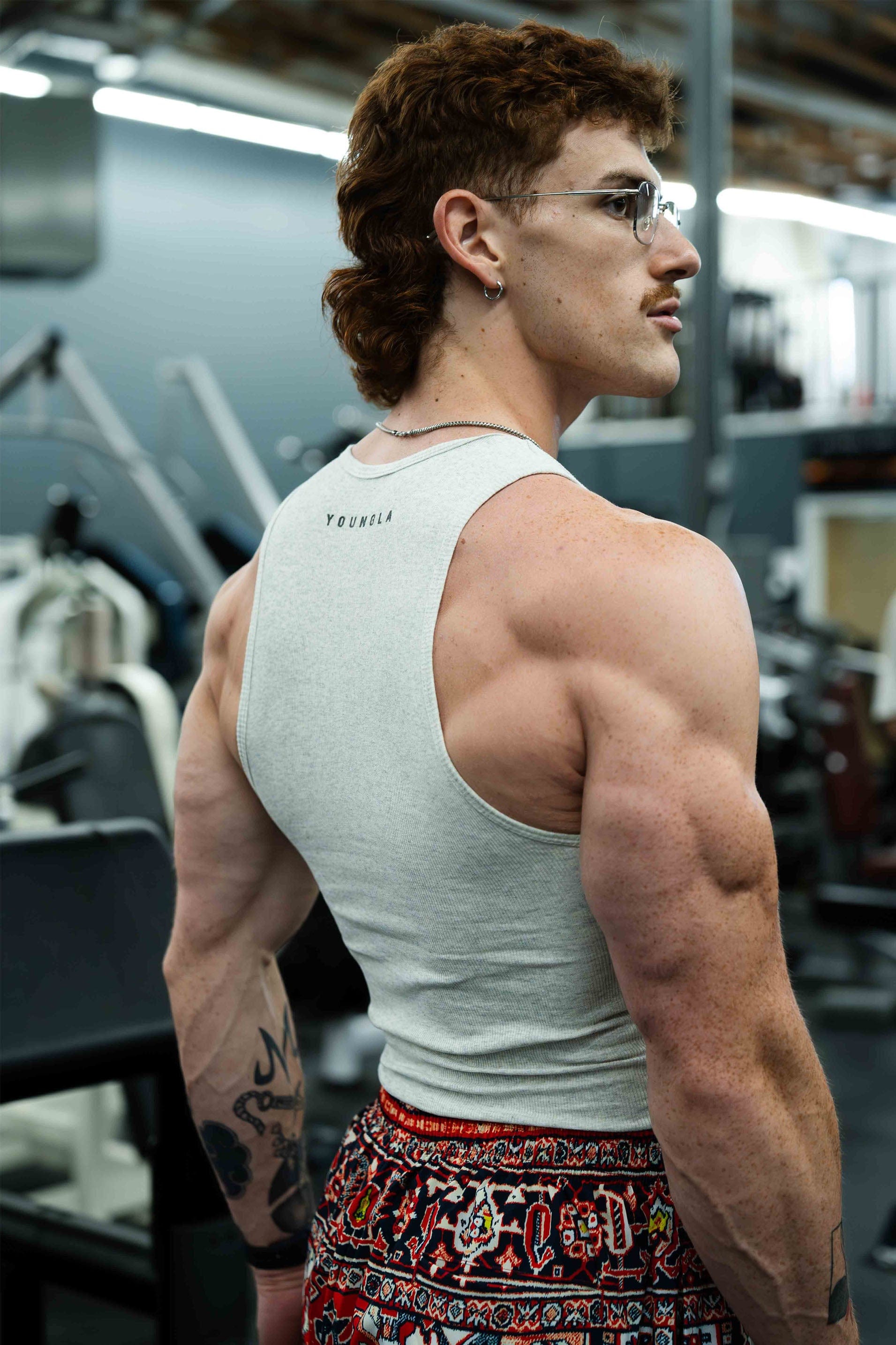 Folded black tank top from pack 1 – sleek gym-ready styling