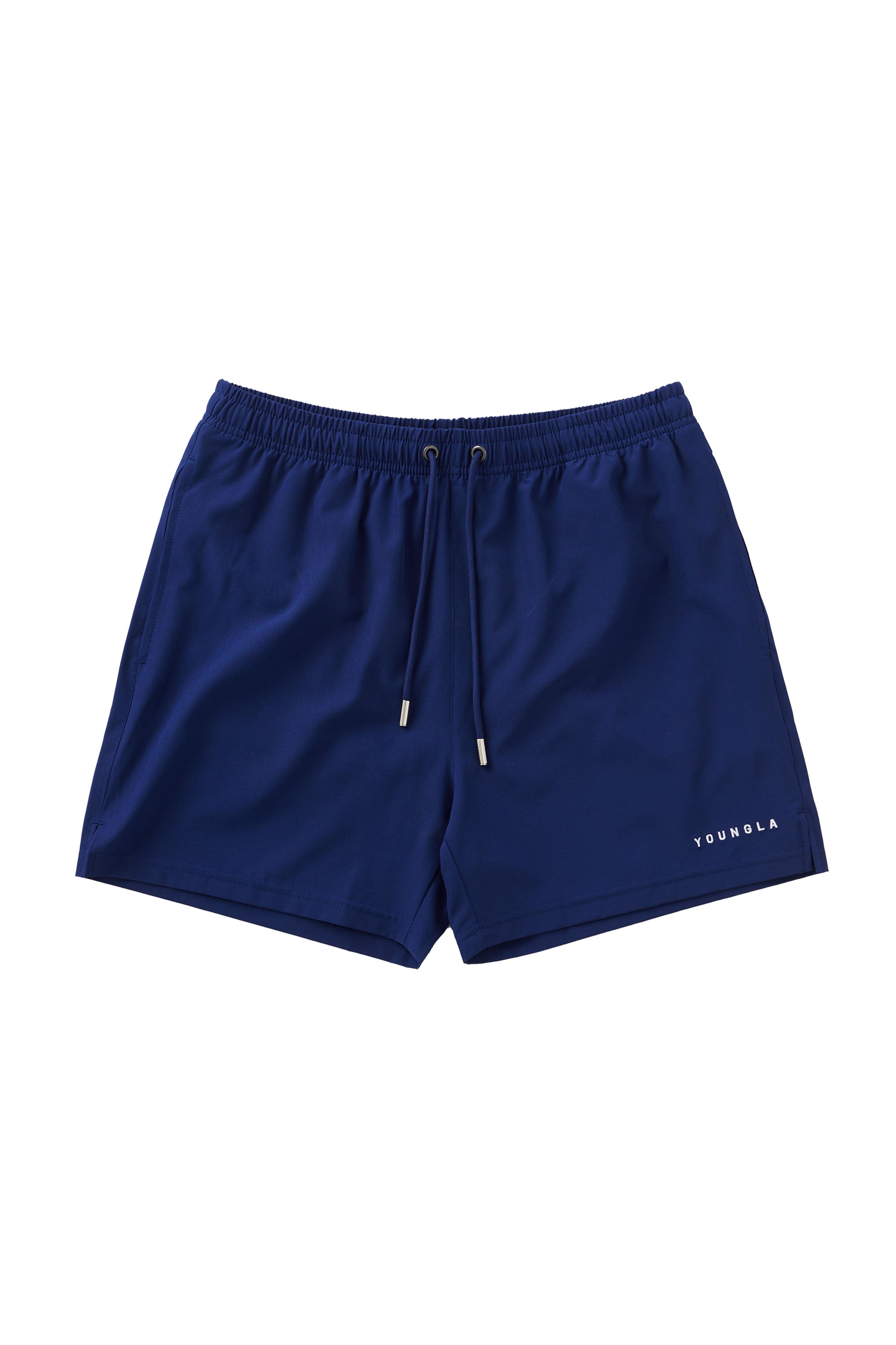 Model wearing Frooty swim shorts on a beach