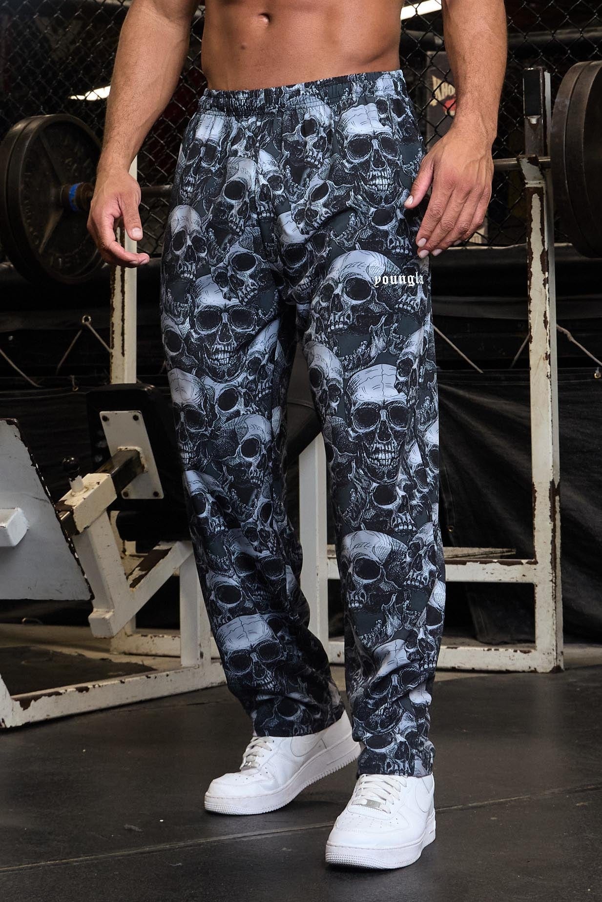 Side profile of mens workout pants made from lightweight polyester and elastane