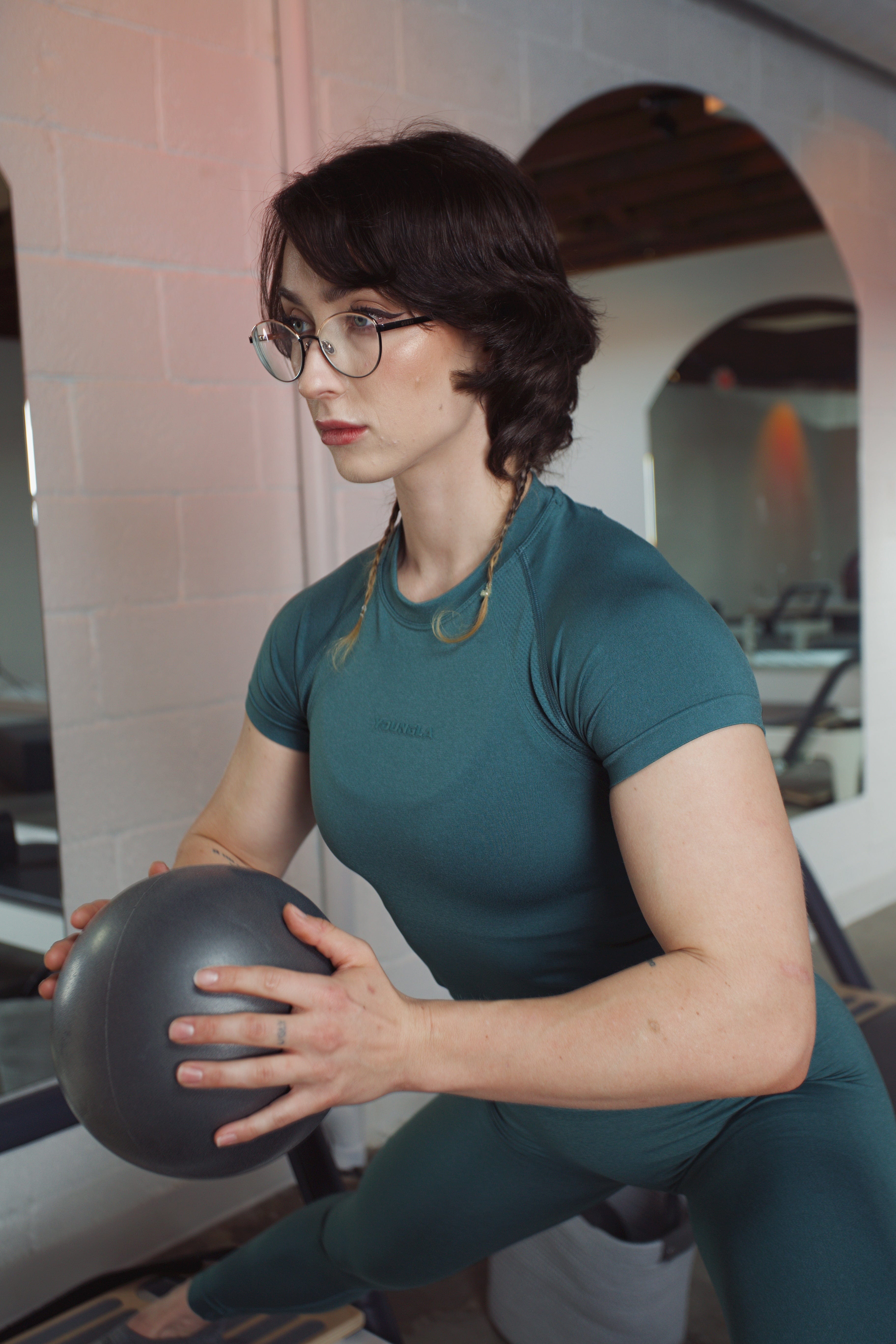 Side angle of mens compression shirt highlighting texture details.