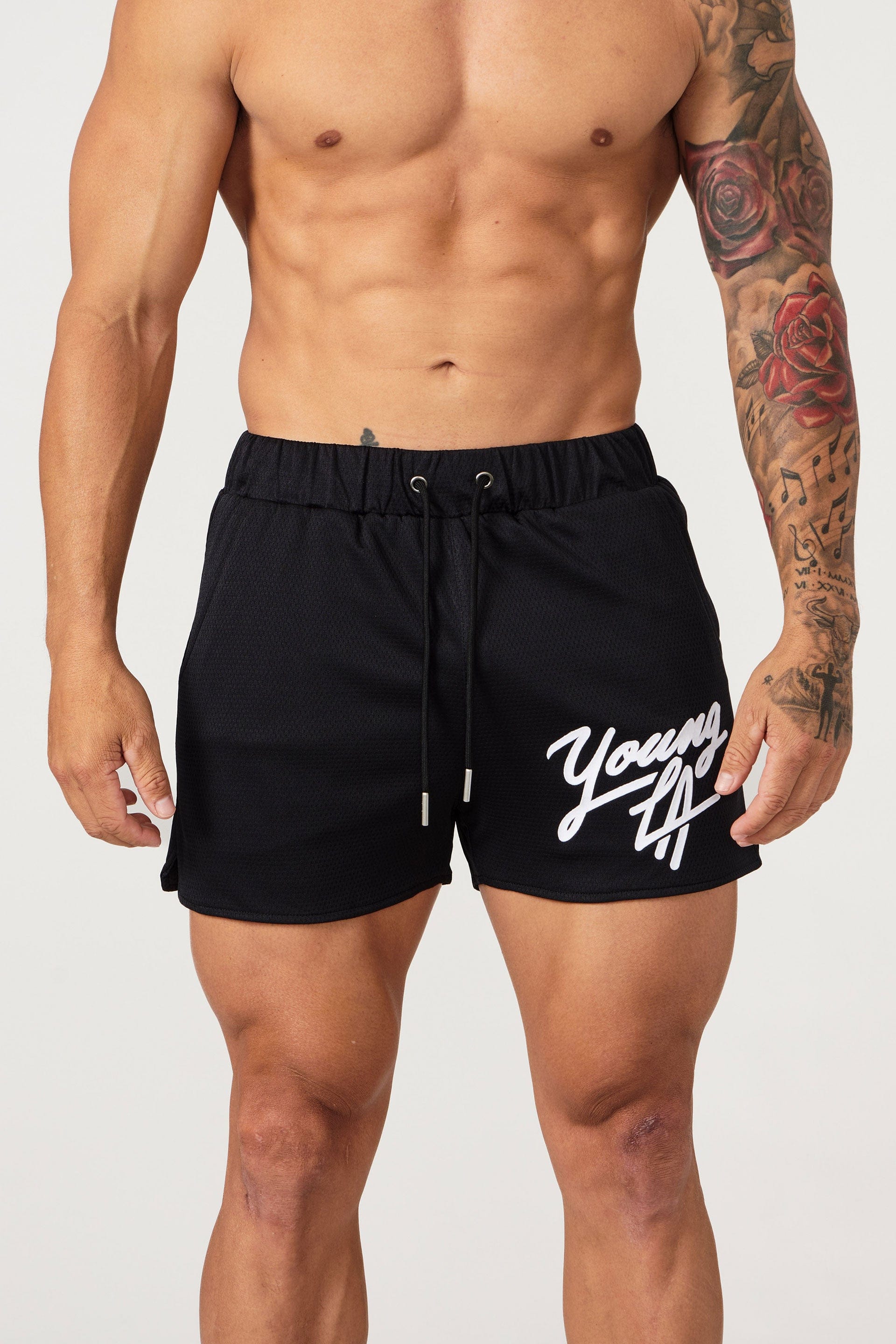 Gray mens workout shorts on hanger showing waistband detail
