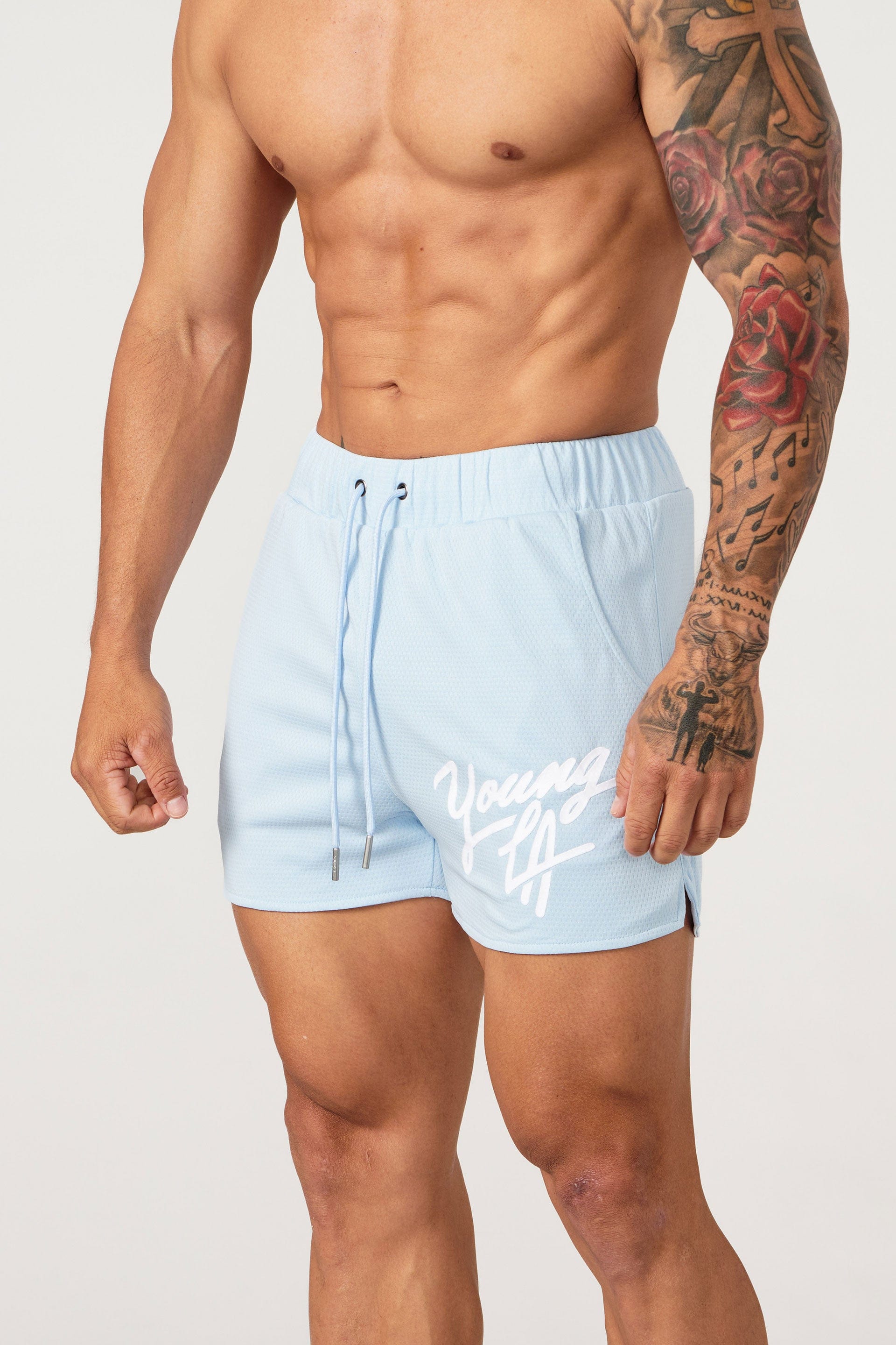 Gray mens workout shorts on hanger showing waistband detail