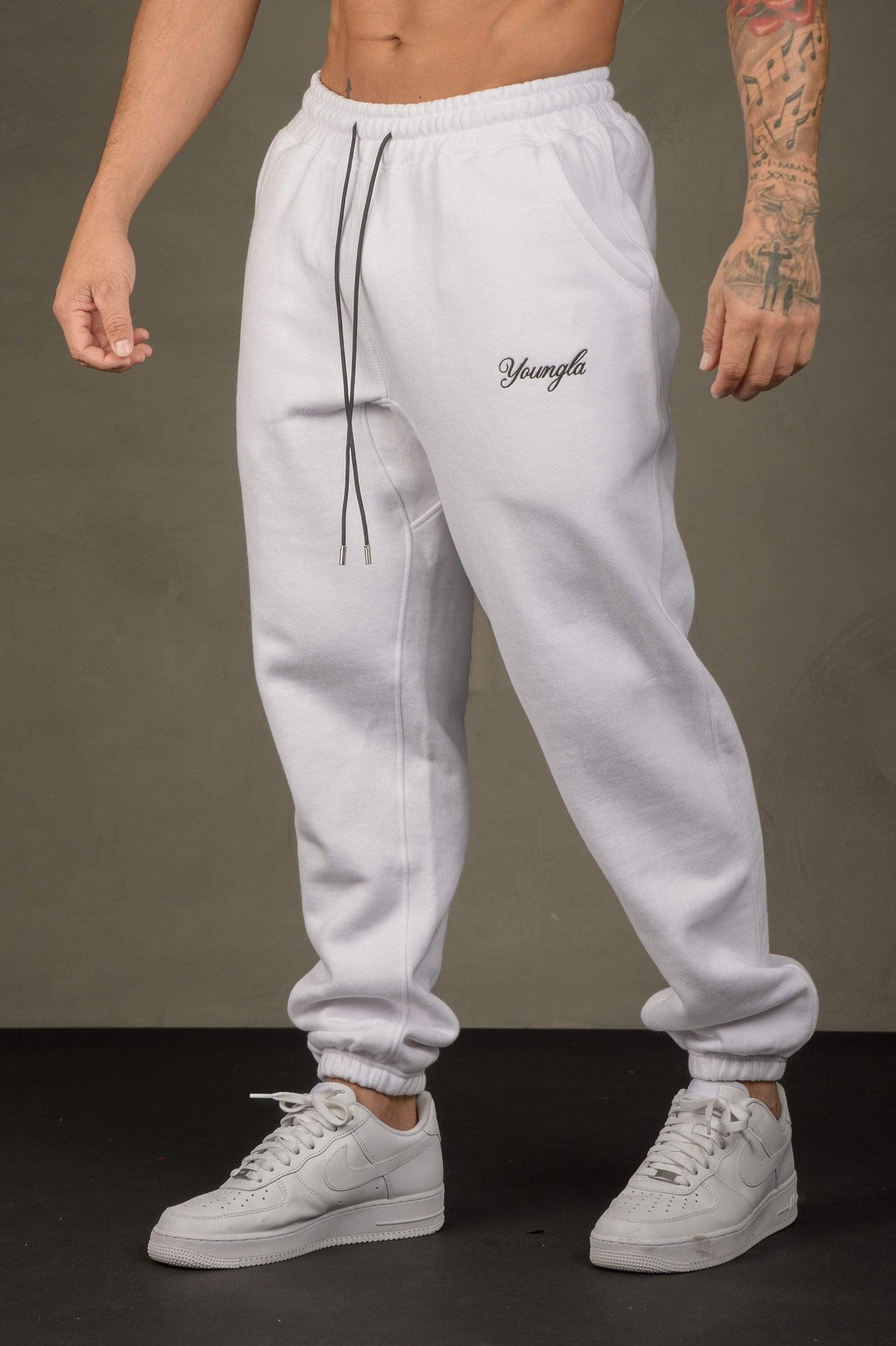 Back view highlighting elastic waistband and embroidered logo