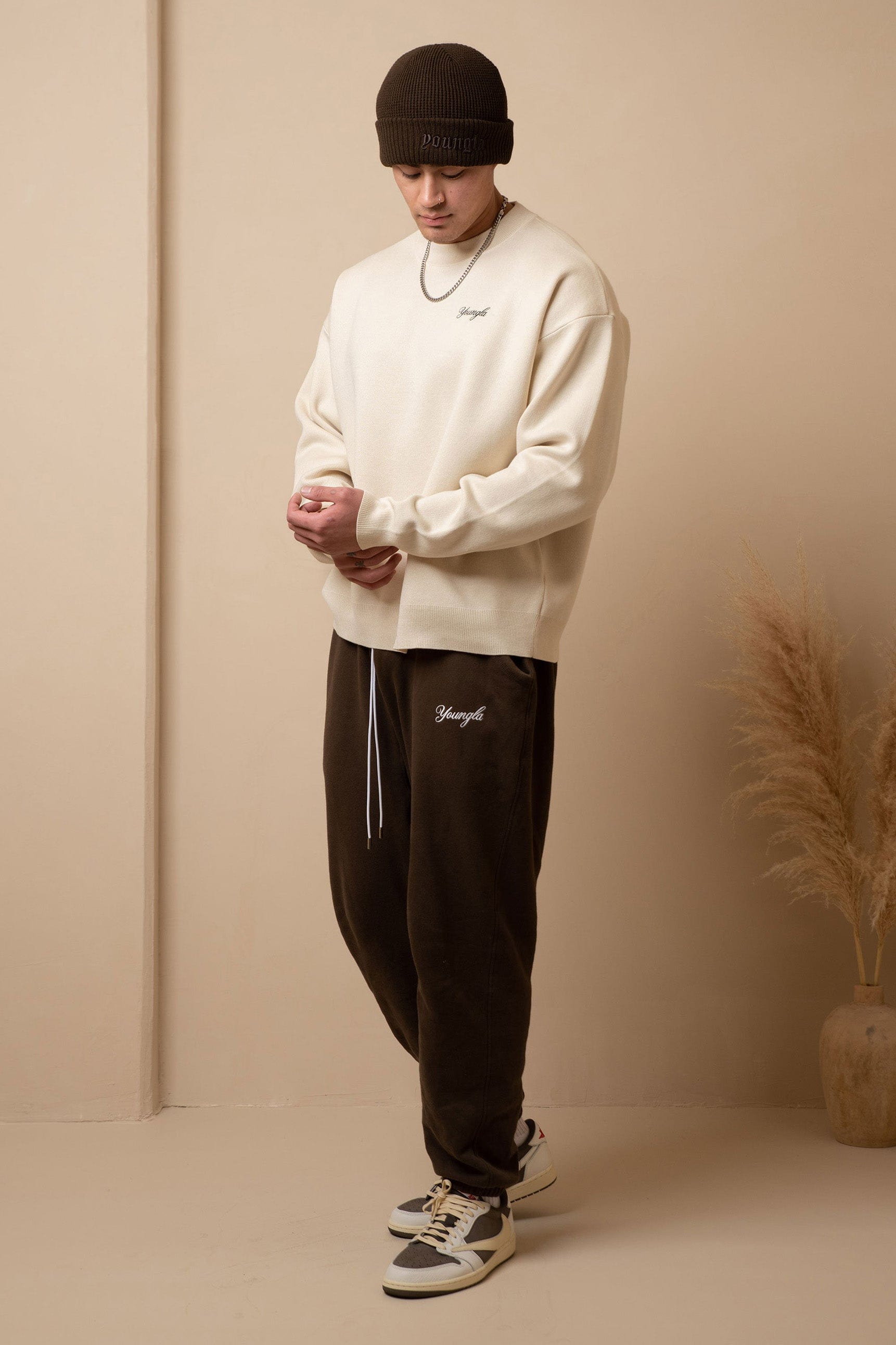 Back view highlighting elastic waistband and embroidered logo