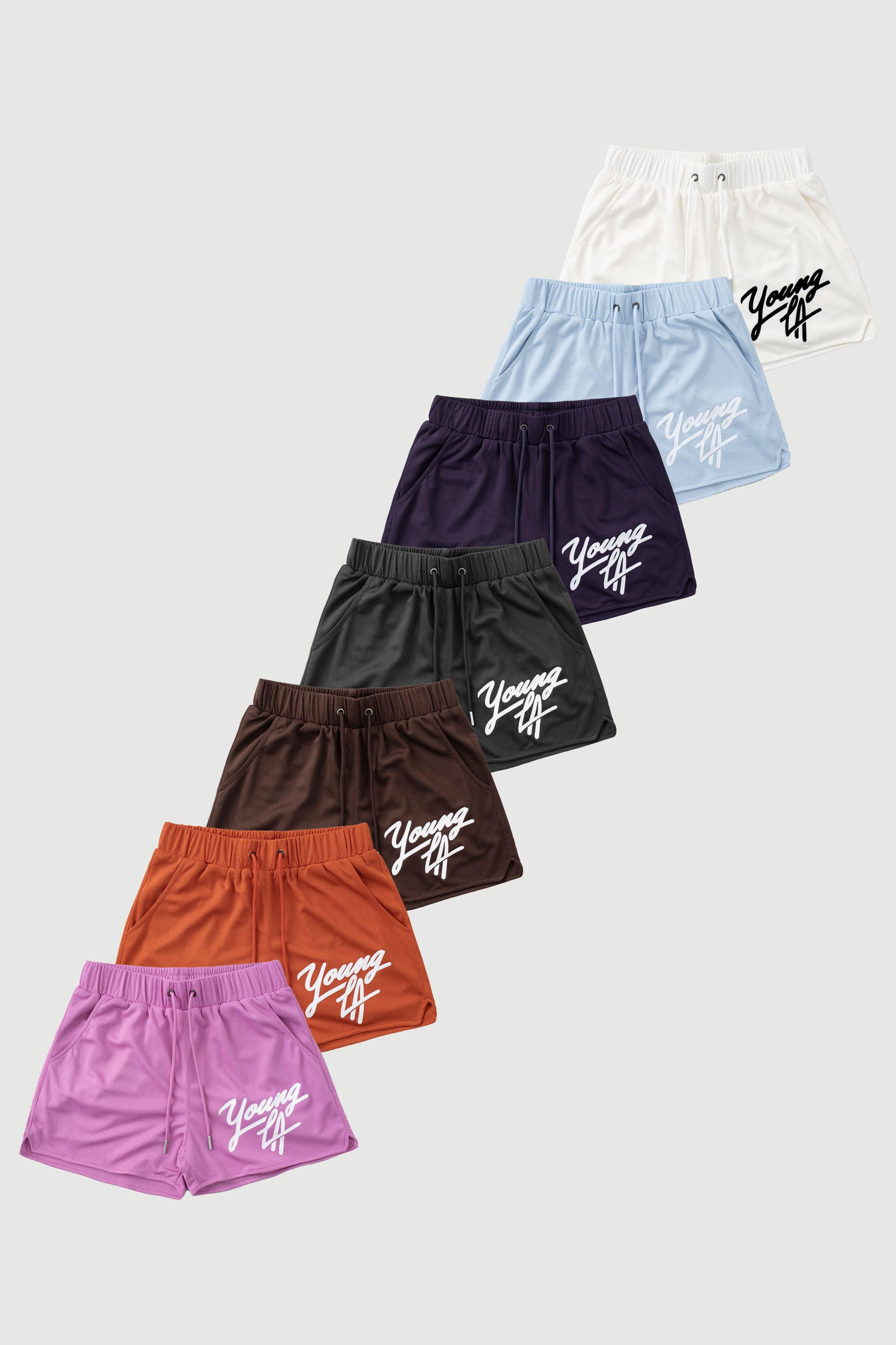 Athlete performing squats in Legacy shorts outdoors