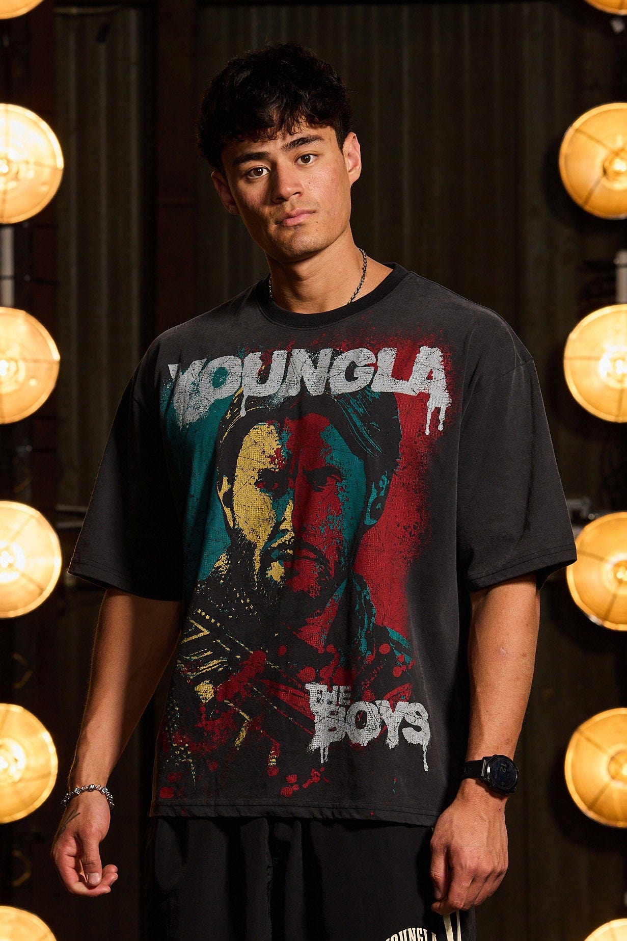 Model showcasing pop culture clothing tee in downtown NYC