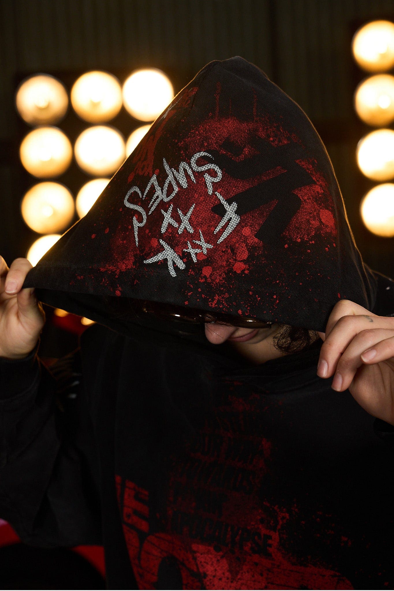 Front view of the oversized graphic hoodie highlighting its bold design.