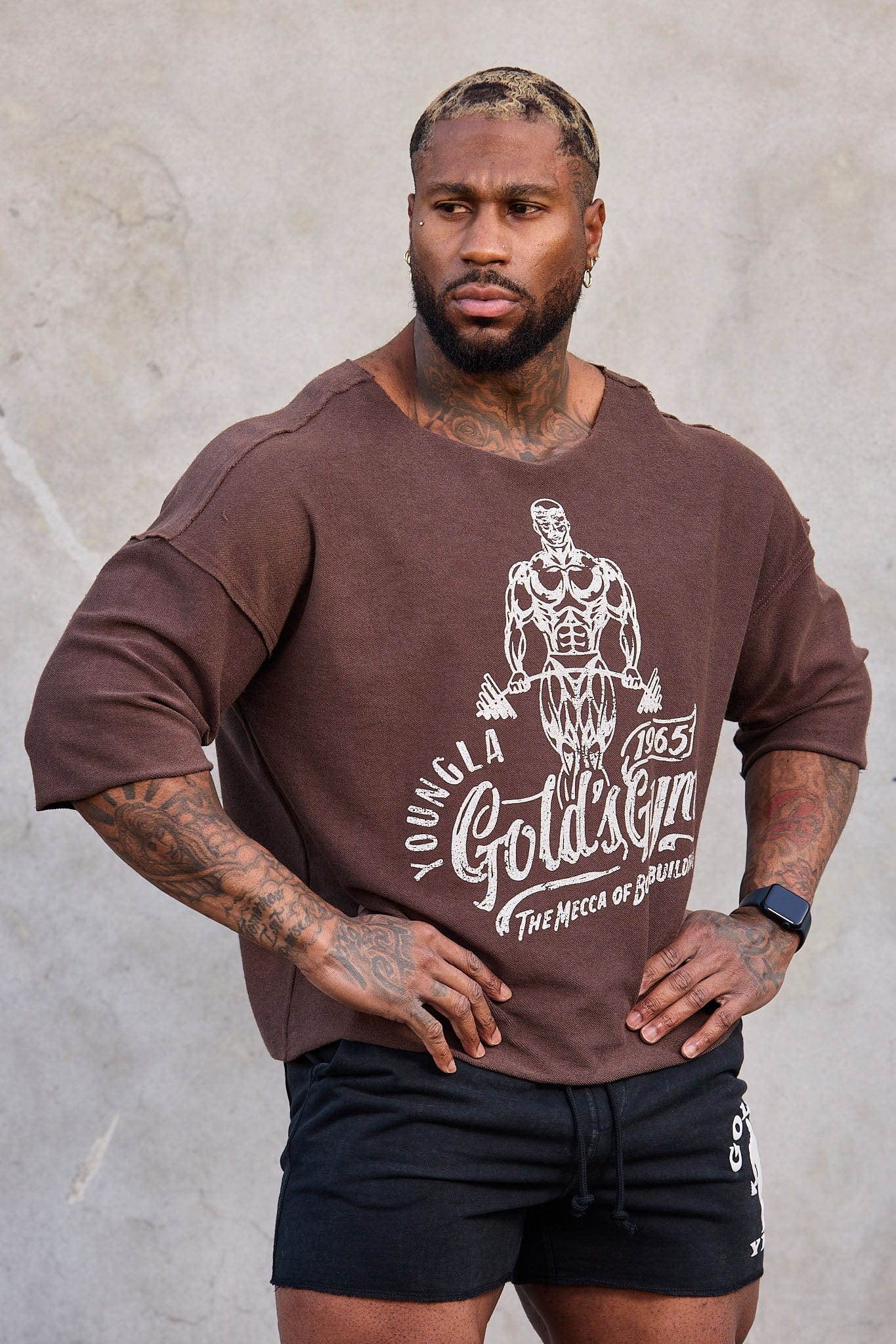 Front view of Gold's Gym Vintage Wide Neck Tee, showcasing its relaxed fit.
