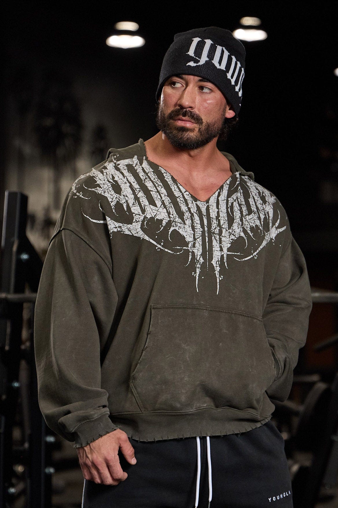 Front view of the distressed anarchy hoodie with bold logo and rugged design