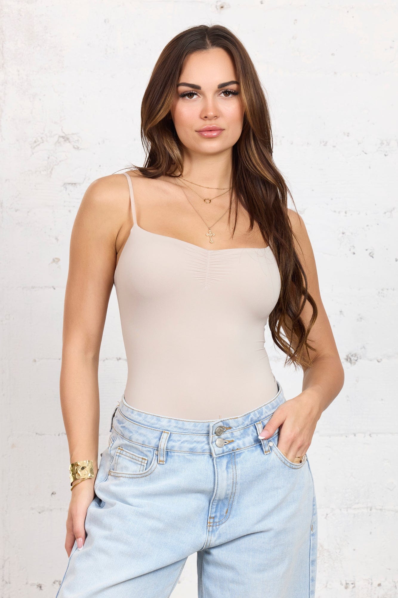 Close-up of the fabric texture of the strapless bodysuit.